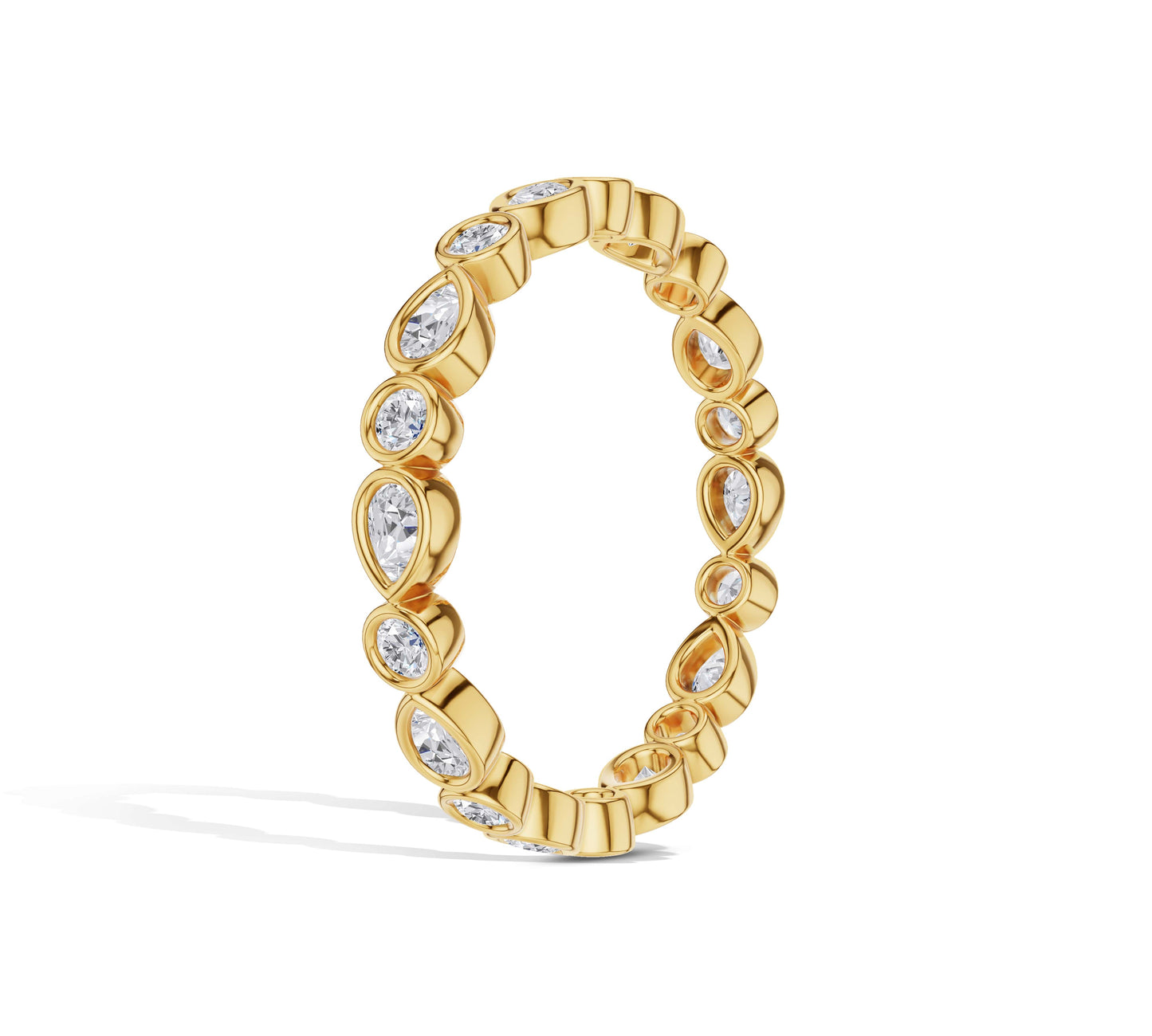 18K yellow gold pear and round diamond ring