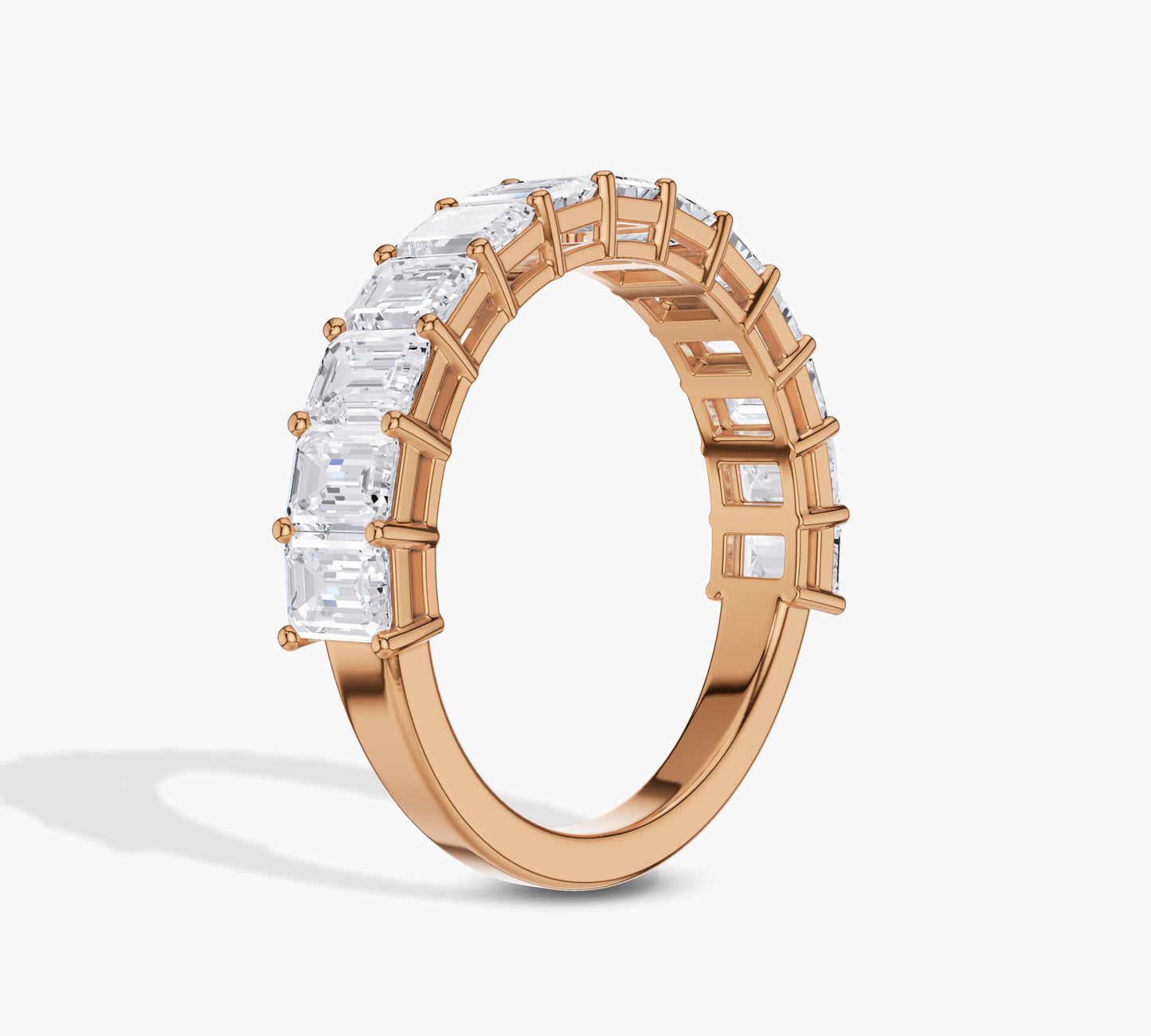 High-shine gold ring with step cut diamonds