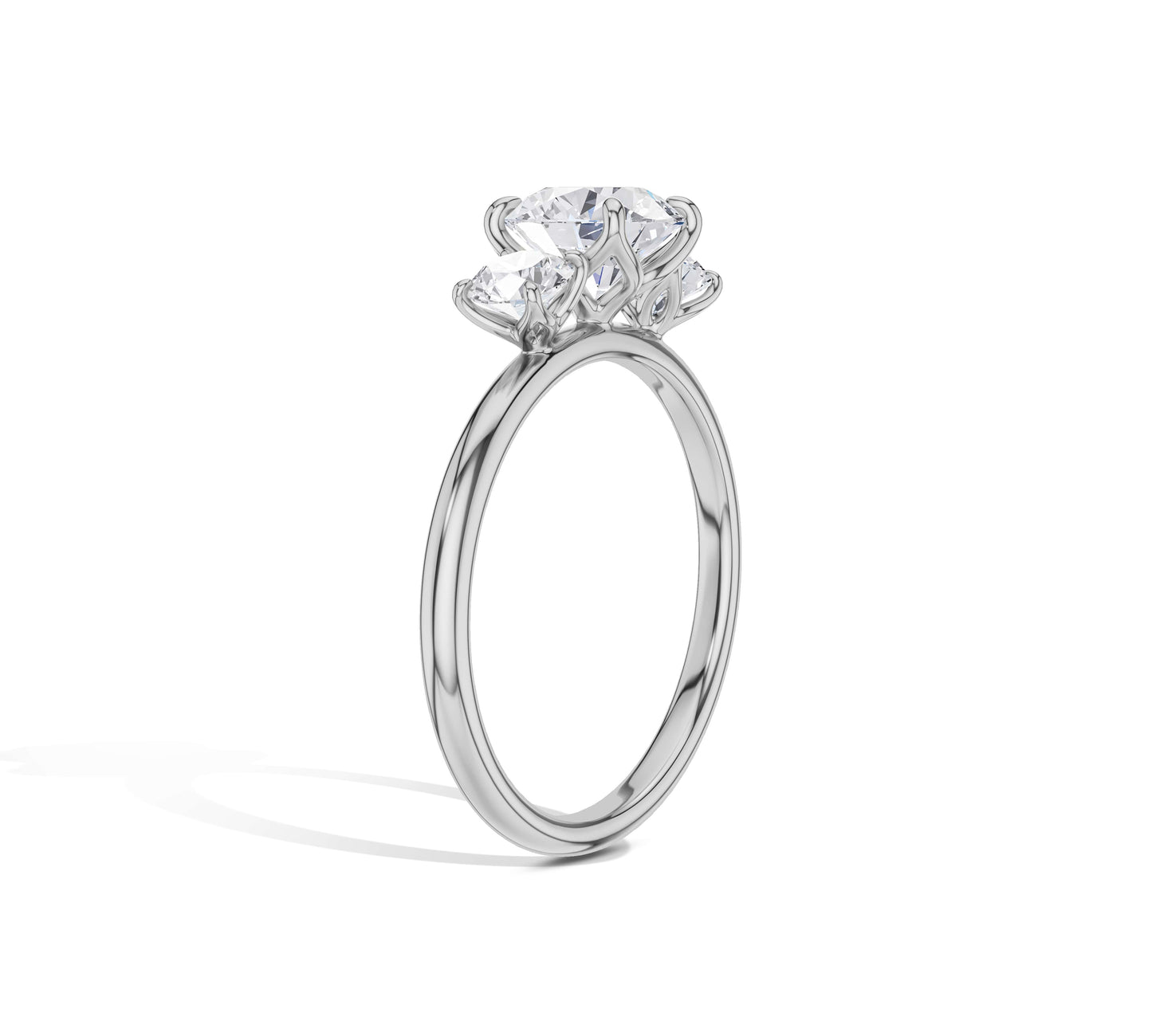 Timeless engagement ring with three stones