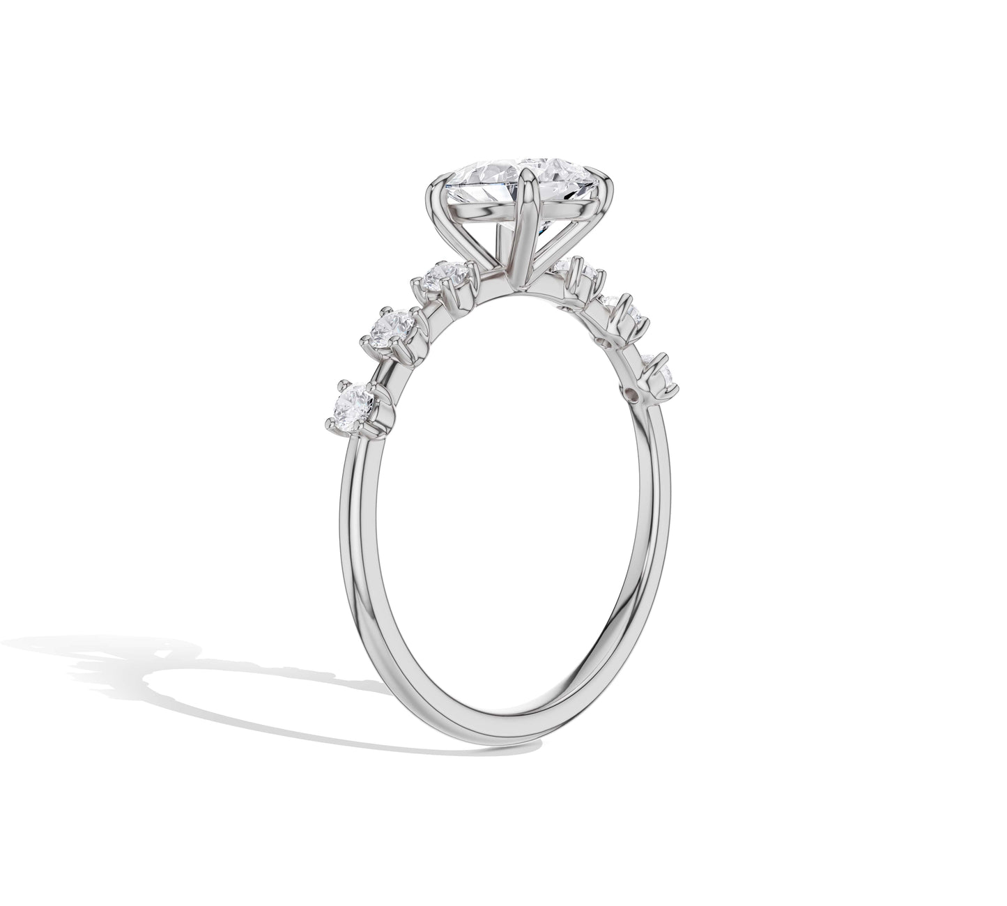 White gold teardrop diamond ring with side stones