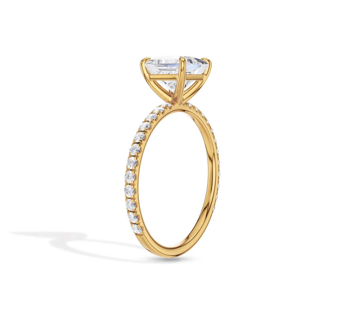Elegant princess diamond ring in yellow gold pavé setting