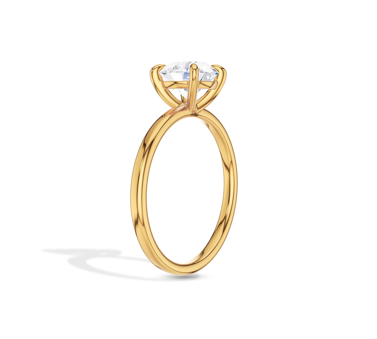 Timeless round brilliant cut ring with smooth gold band