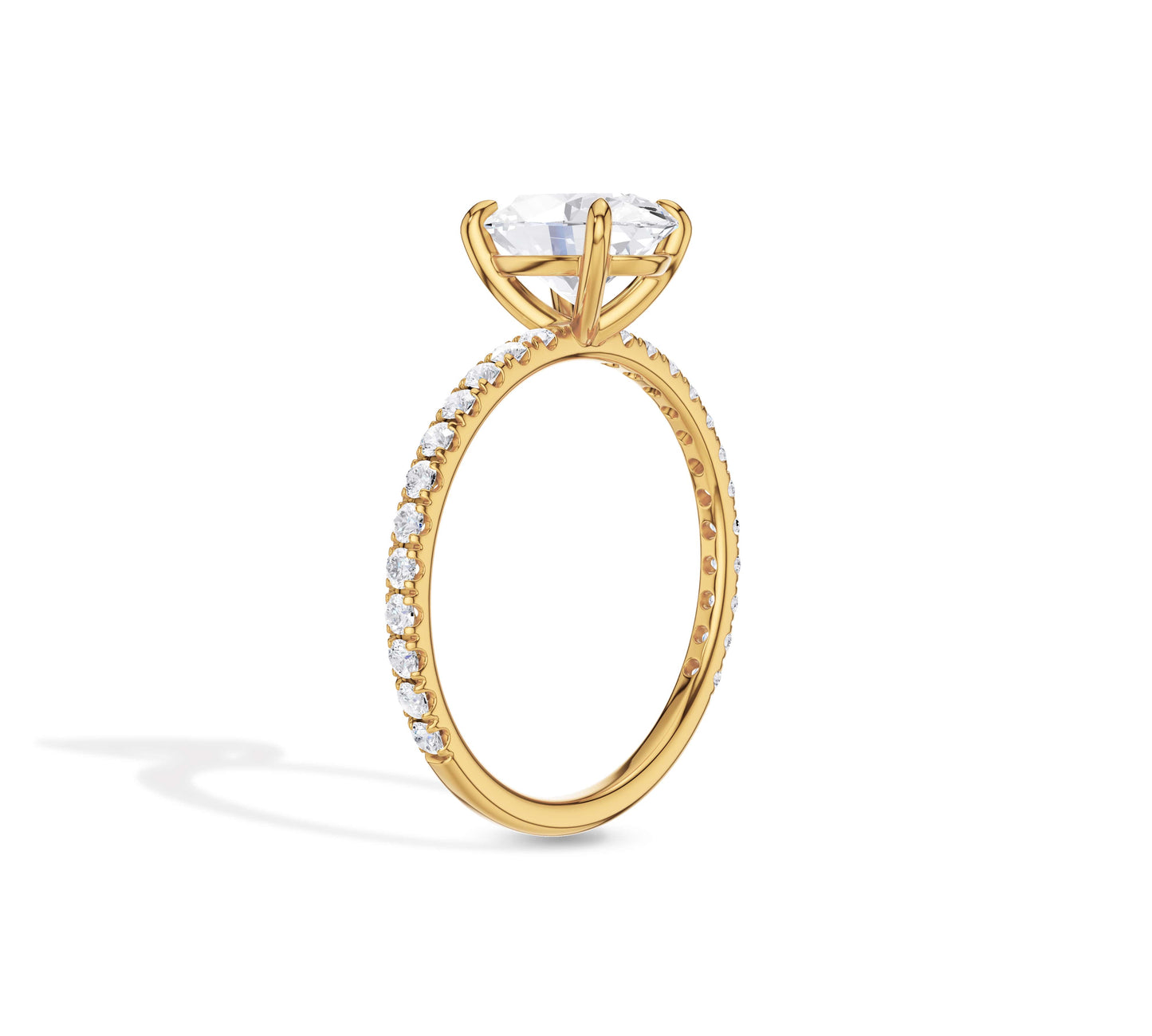 Yellow gold engagement ring with oval diamond center stone