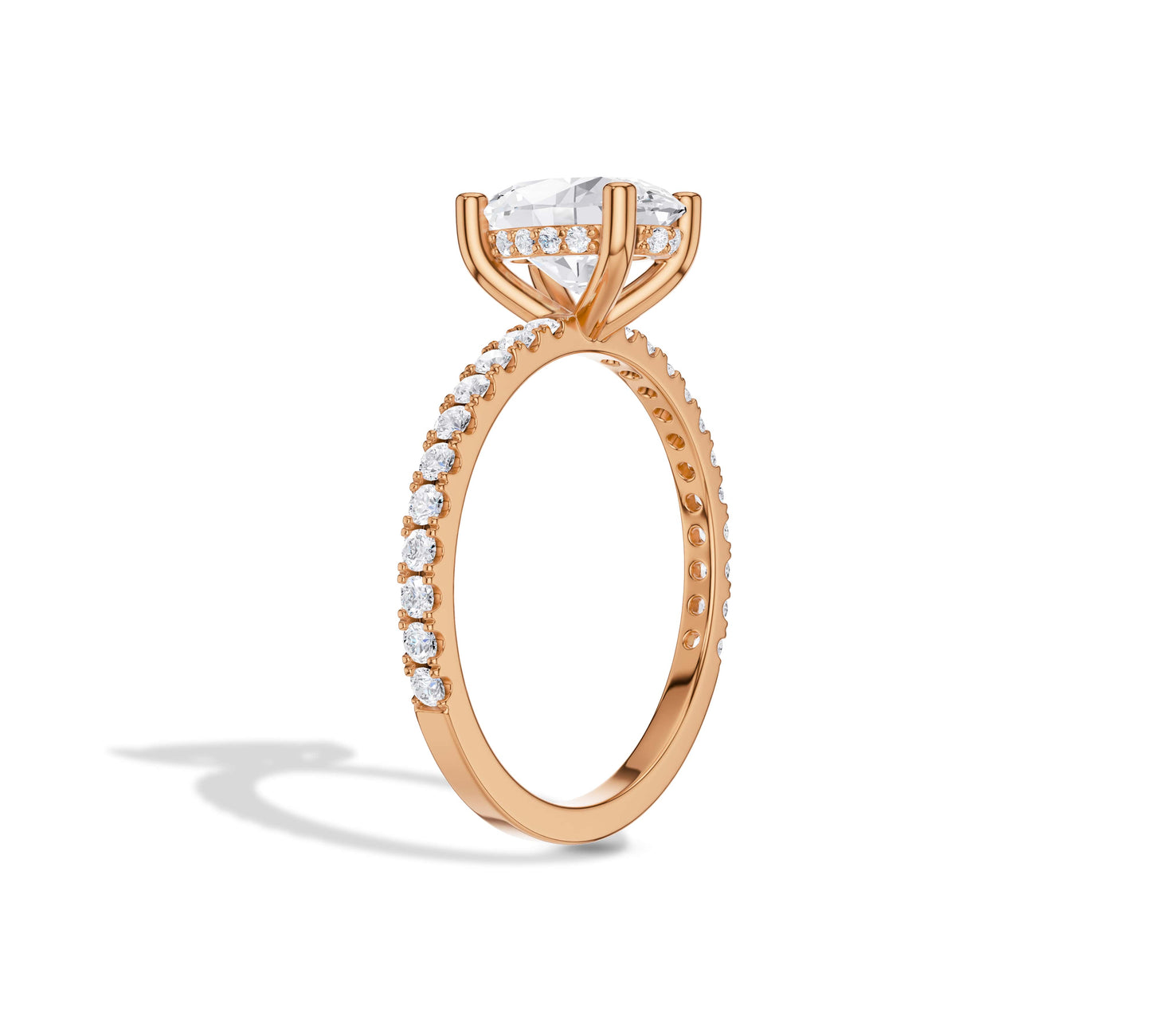 Romantic rose gold oval engagement ring with floating setting