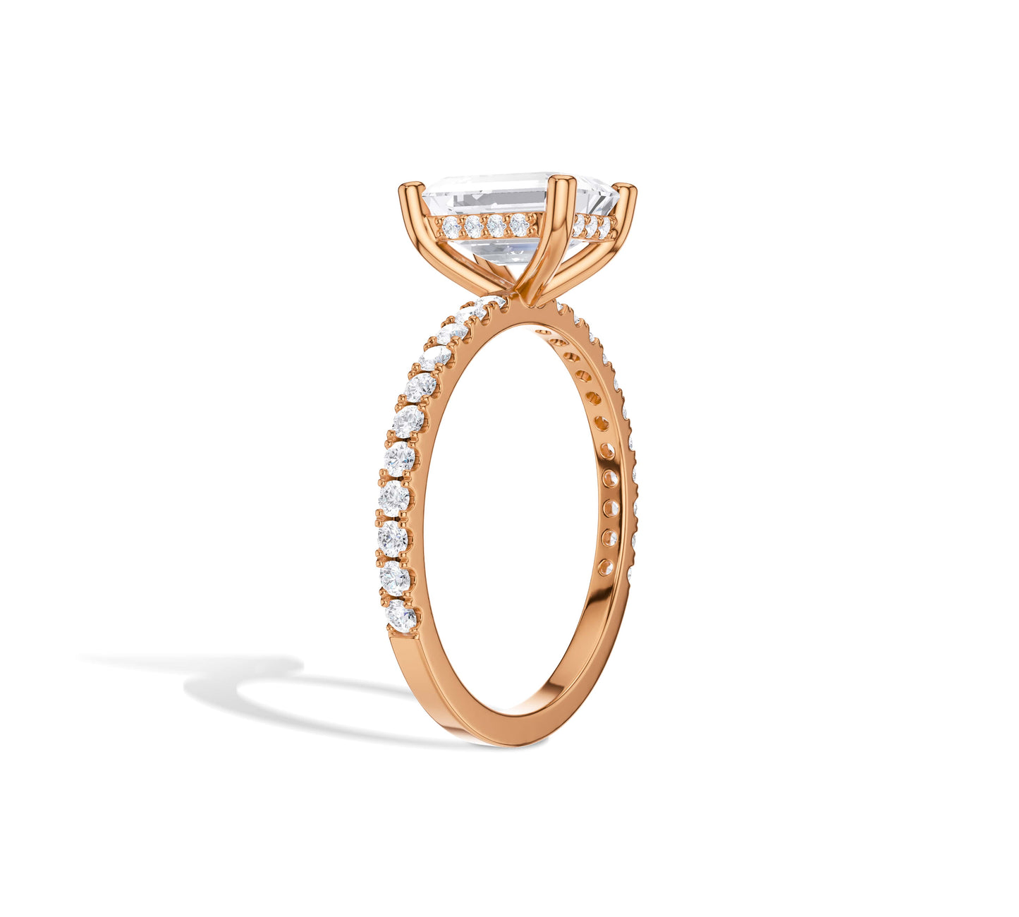 Rose gold pavé ring with emerald lab diamond