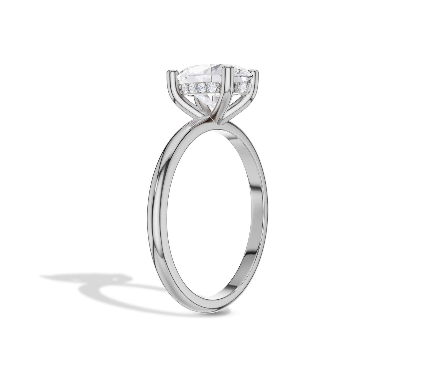 oval engagement ring in secret halo
