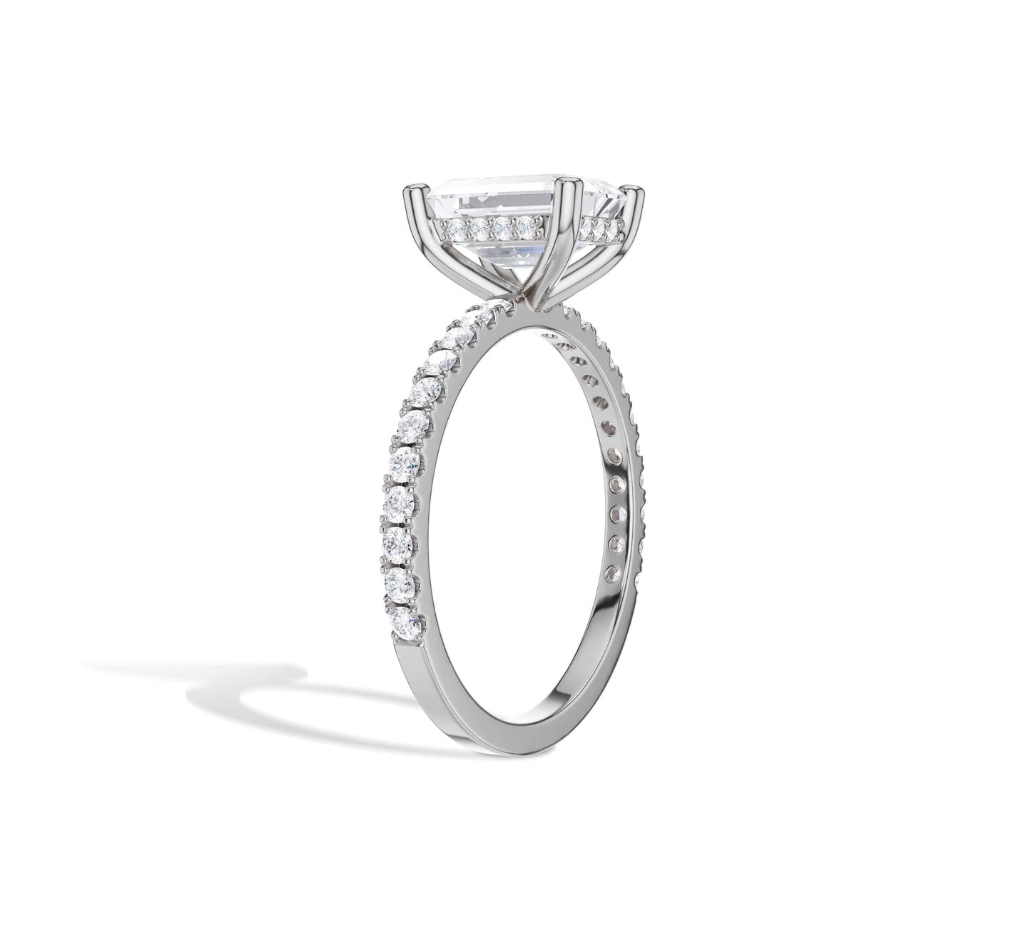 Emerald cut lab diamond in white gold pavé ring