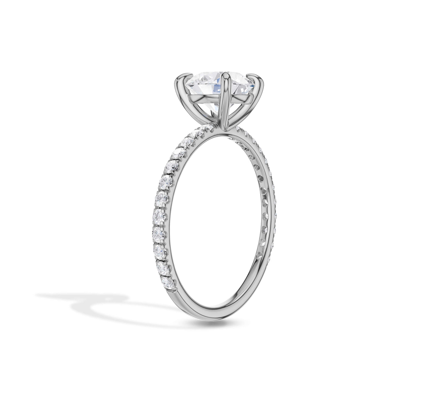 Signature solitaire ring with pavé details in white gold