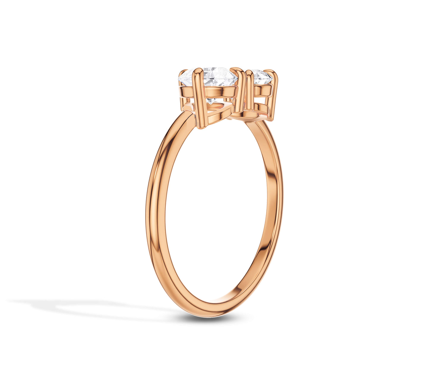 Romantic rose gold engagement ring with two diamond shapes