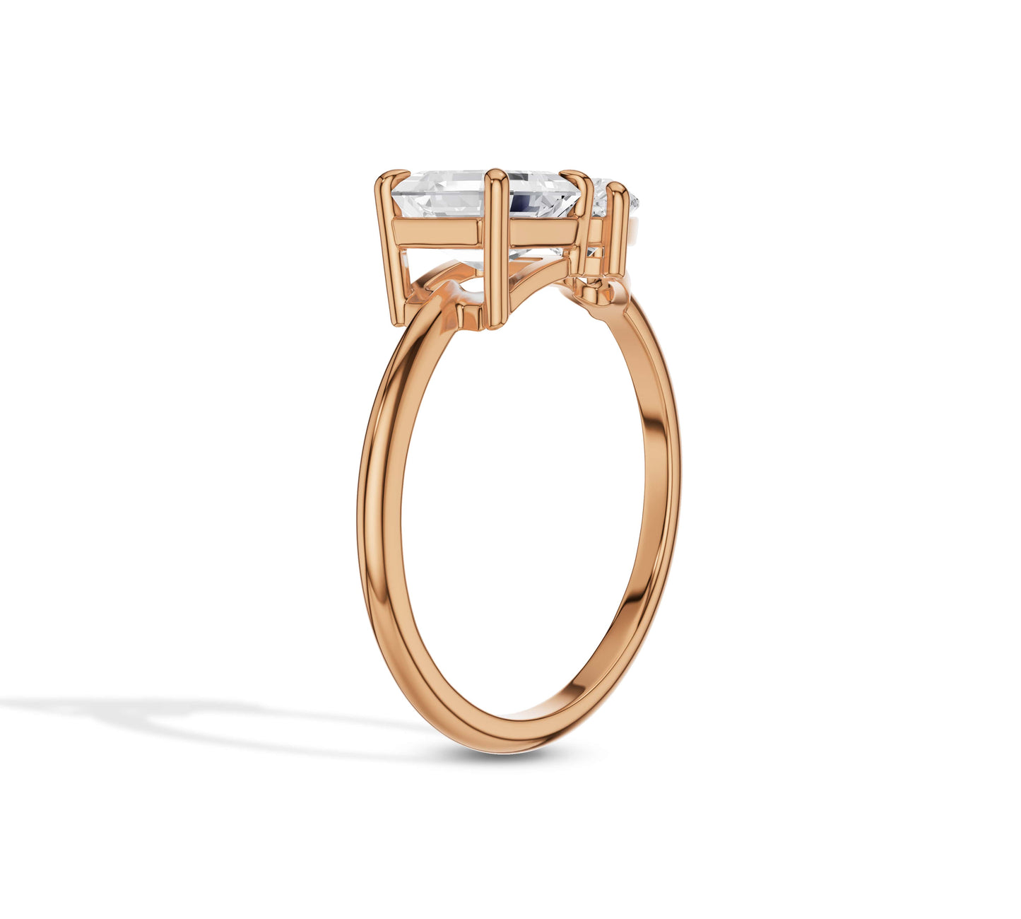 Unique rose gold ring with asscher and heart shaped diamonds