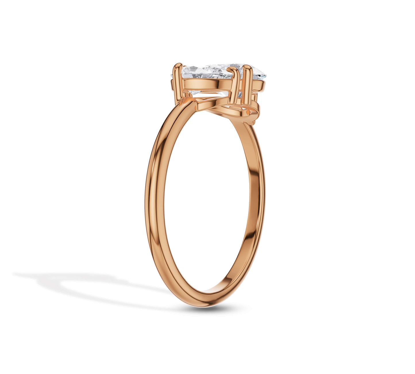 Artistic rose gold design with two pear cuts