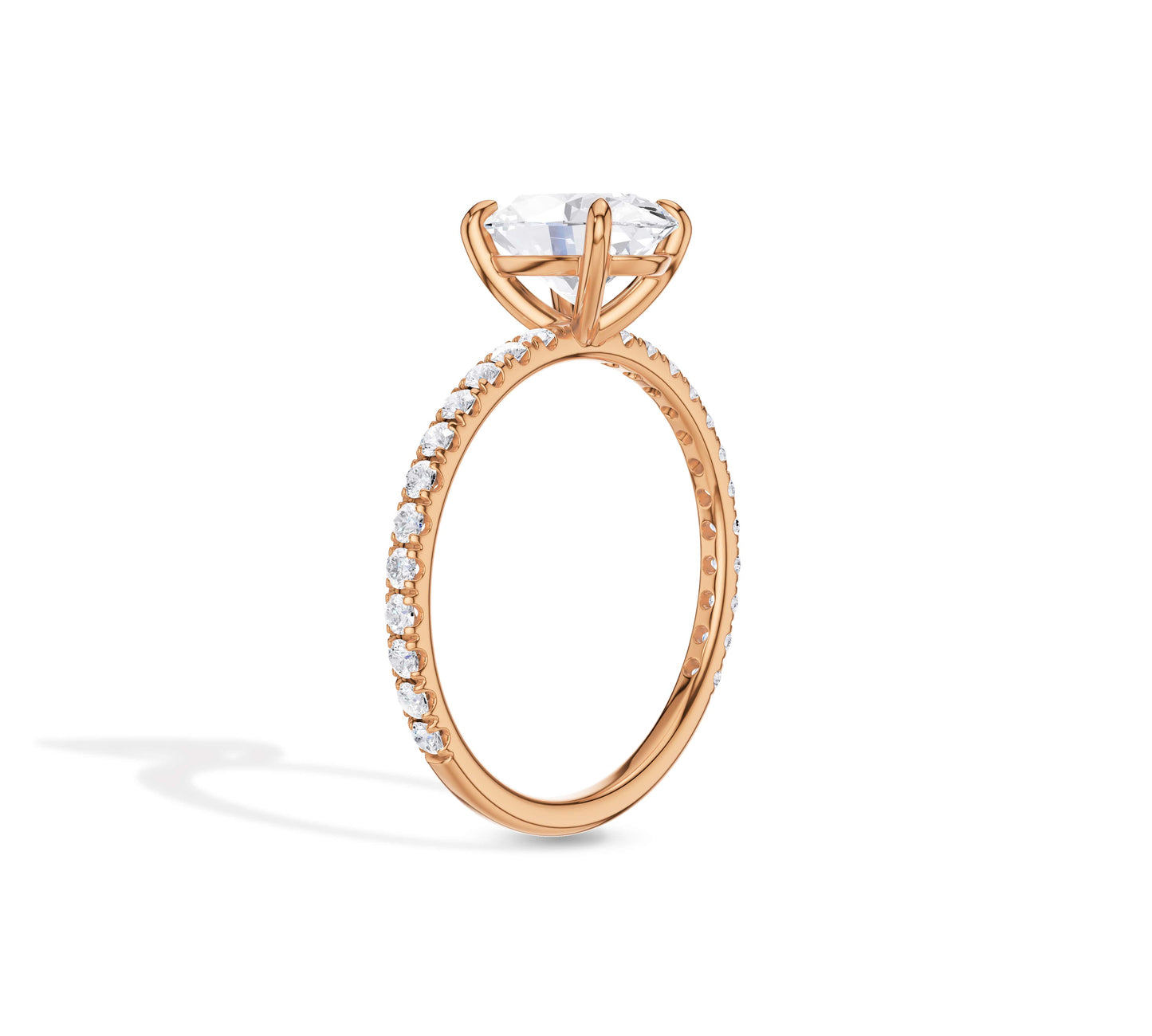Close-up of oval diamond engagement ring in gold
