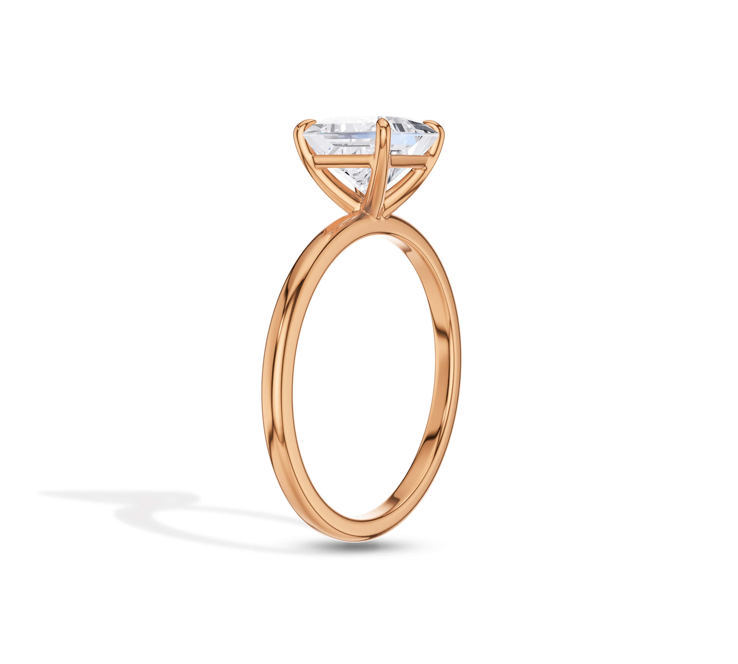 Minimalist rose gold engagement ring with princess diamond