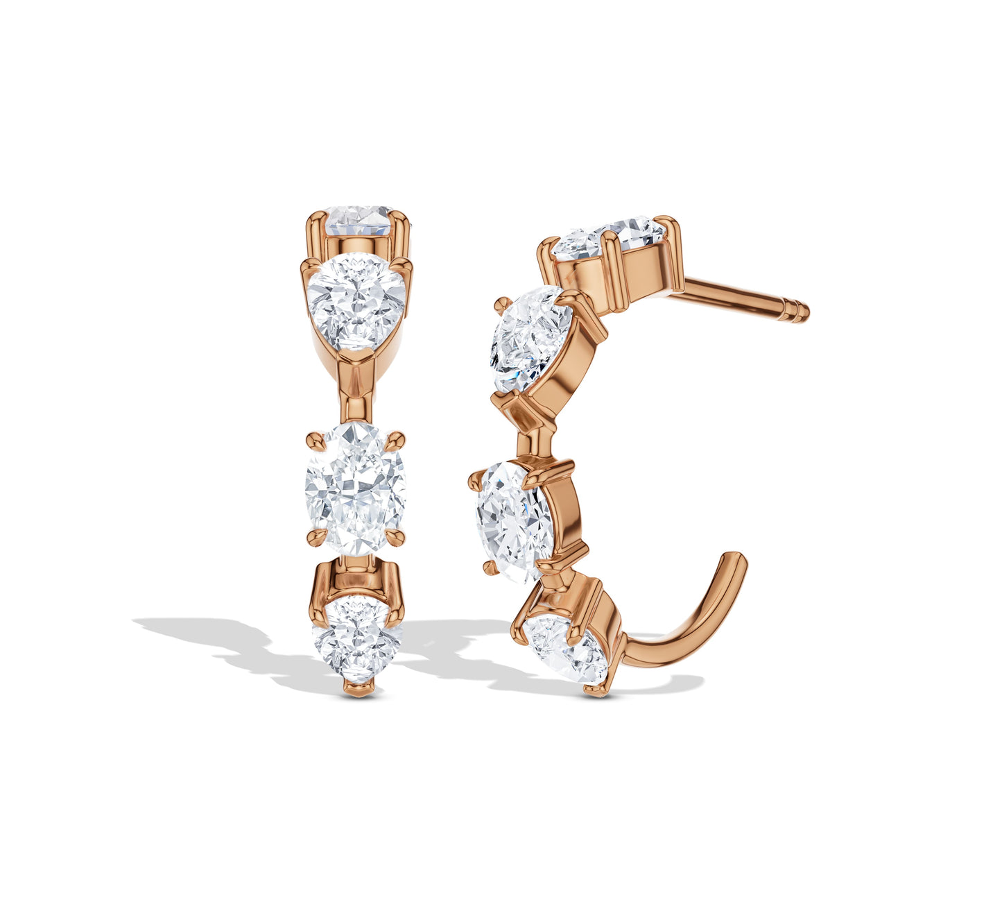 Moissanite and gold earrings in an elegant curve