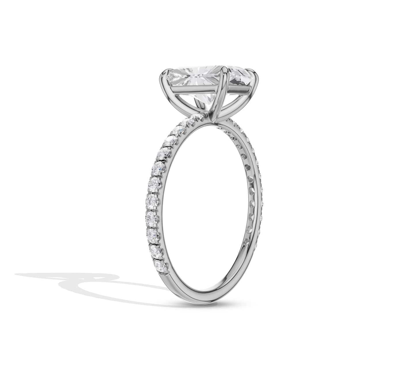 Luxurious radiant solitaire with pavé detailing