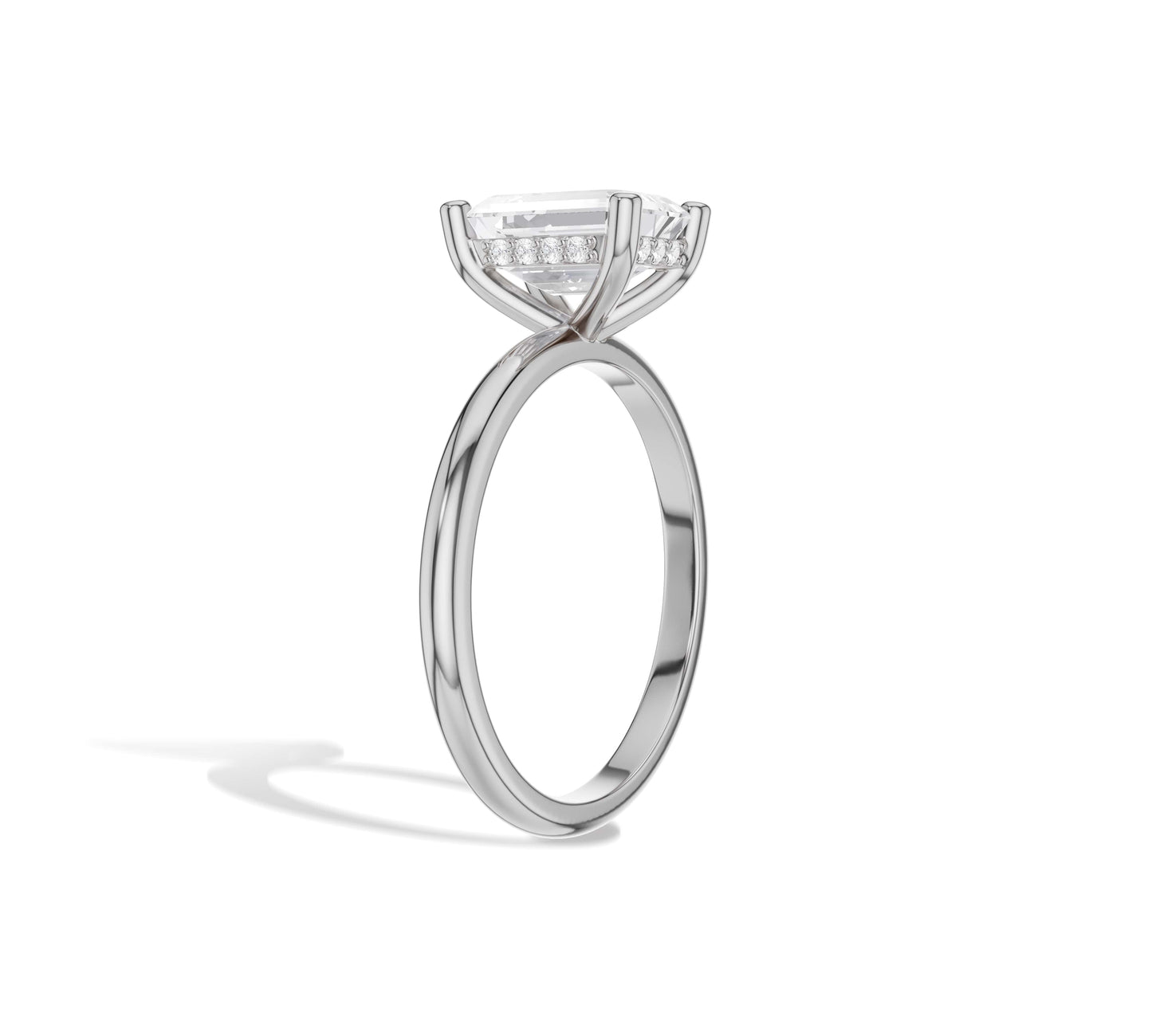 emerald and diamond halo ring