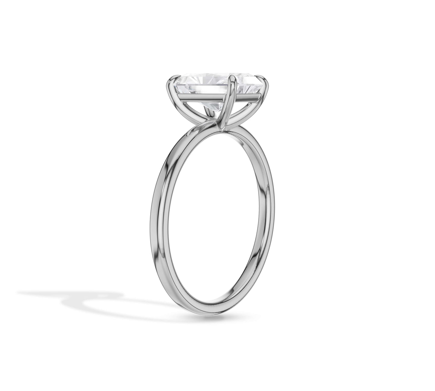 Smooth band highlighting radiant center diamond