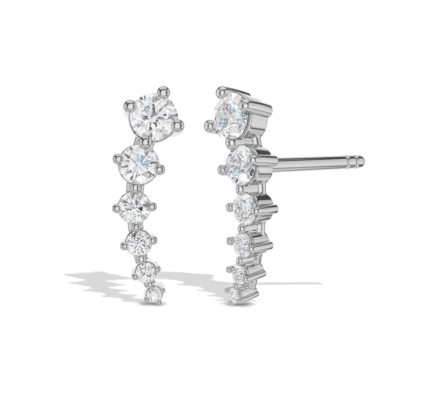 Graduated white gold long drop earrings