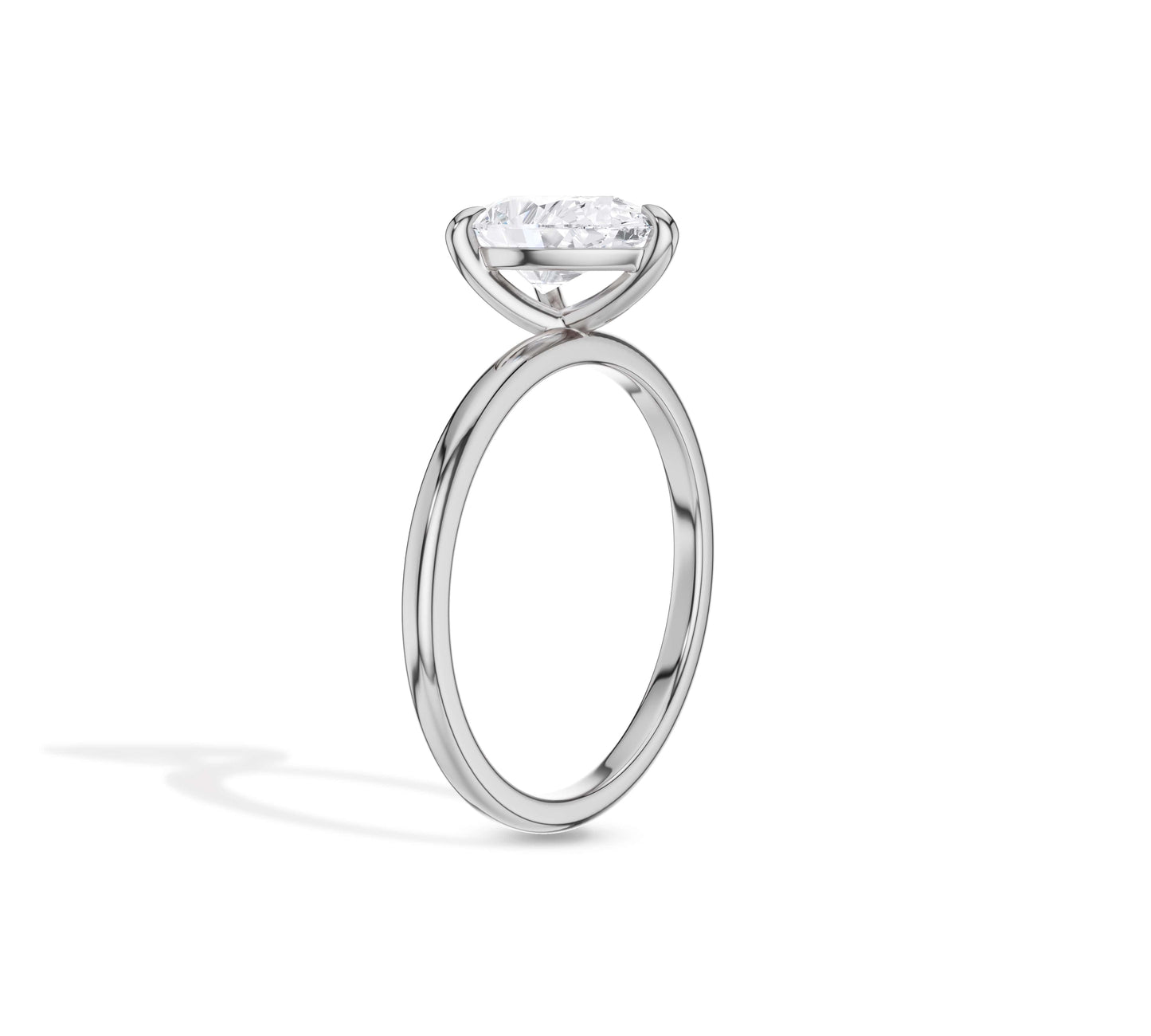 Classic white gold engagement ring with pear diamond