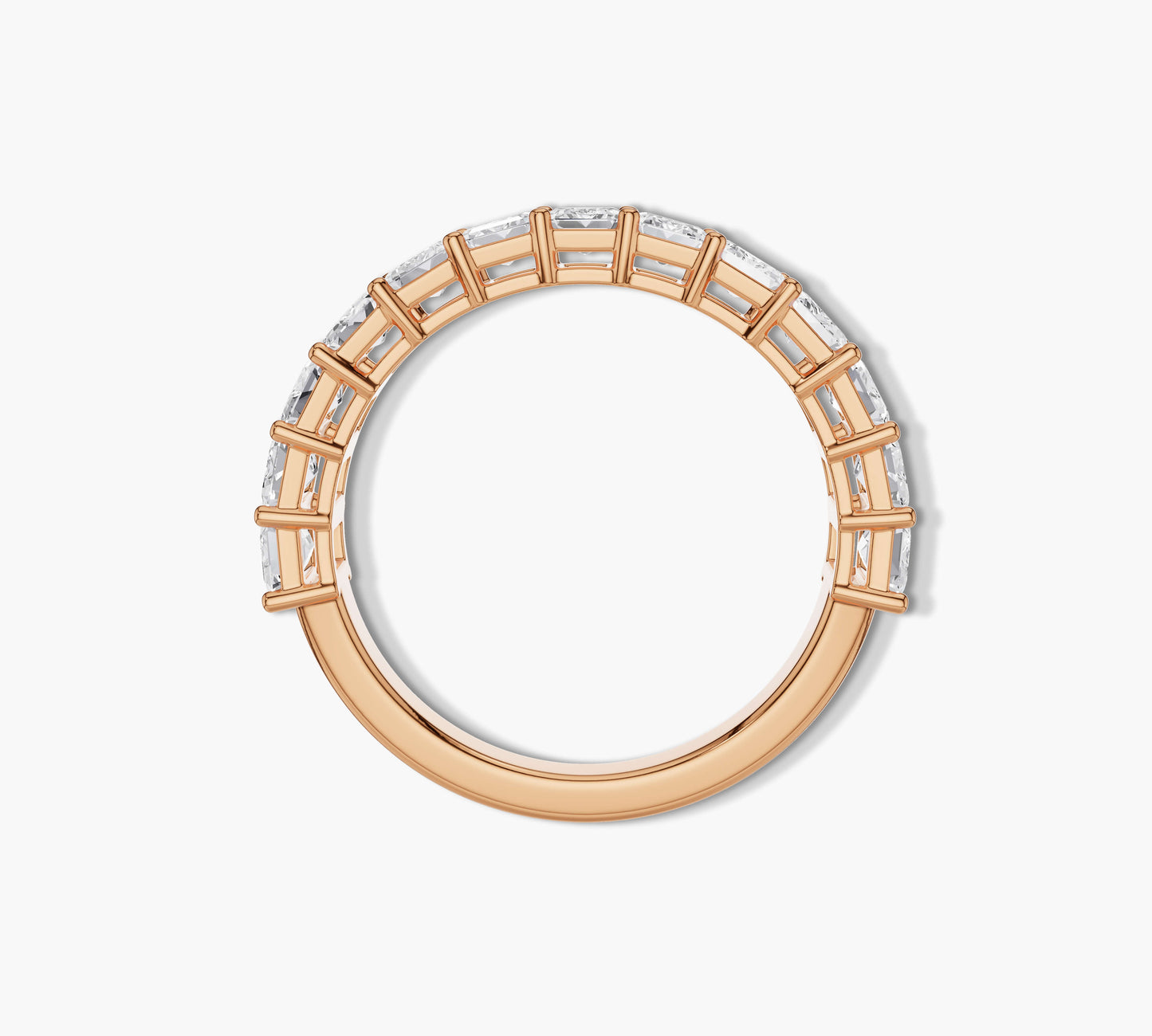 Luxury half eternity band with emerald diamonds