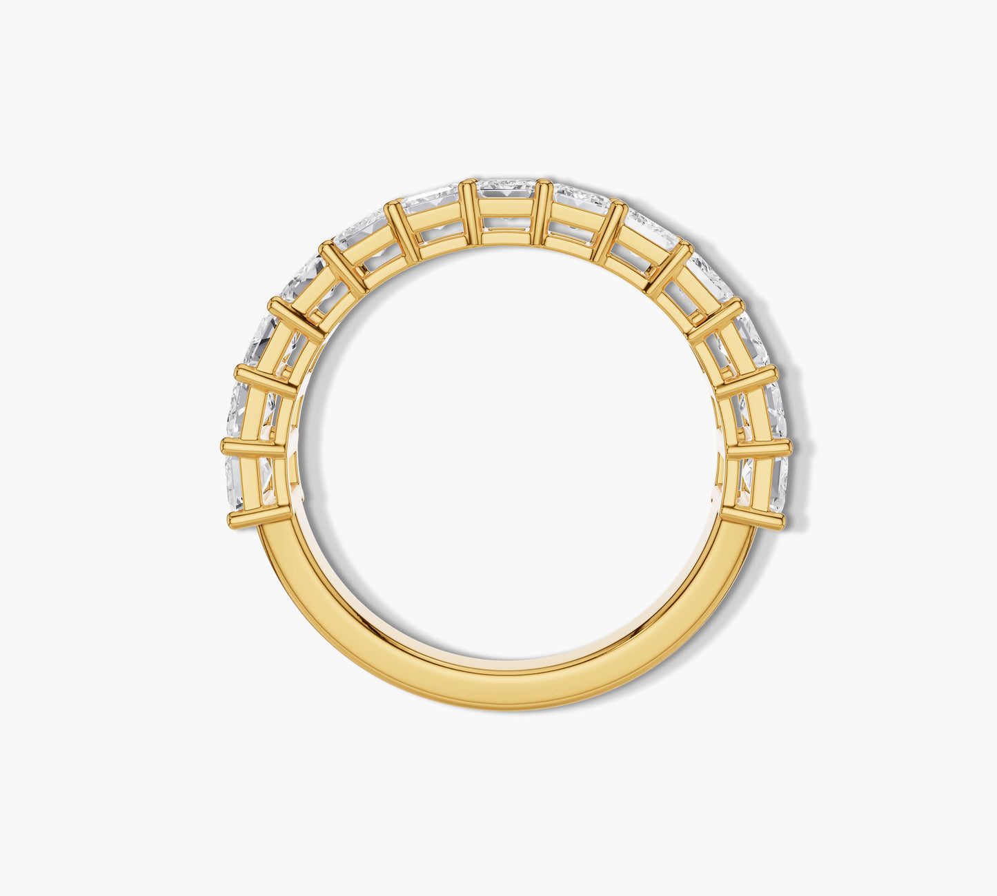 Women’s gold ring with rectangular emerald diamonds