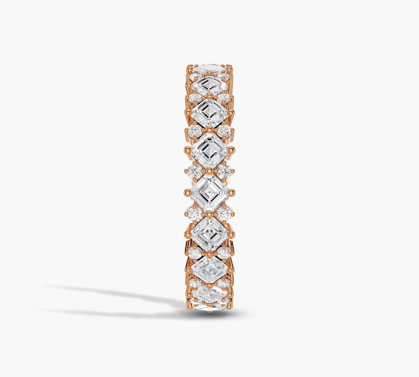 Alternating diamond shapes in full eternity ring