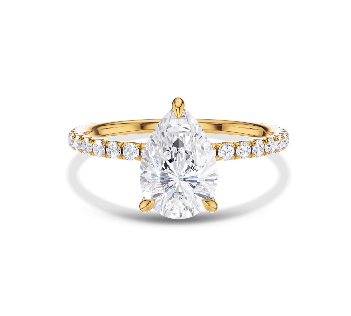 Pear-shaped diamond ring with pavé band in yellow gold