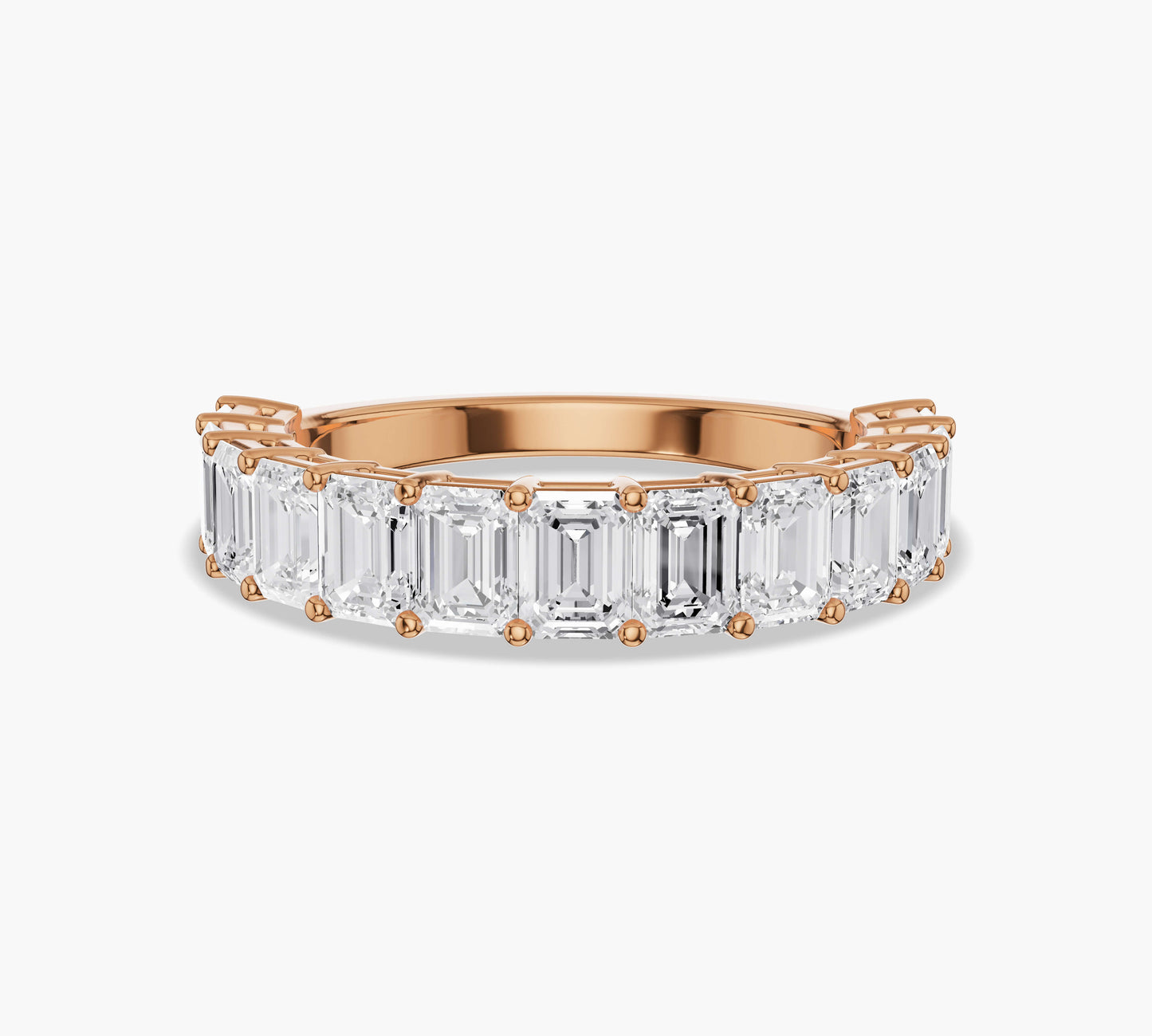 Emerald cut wedding band in yellow gold