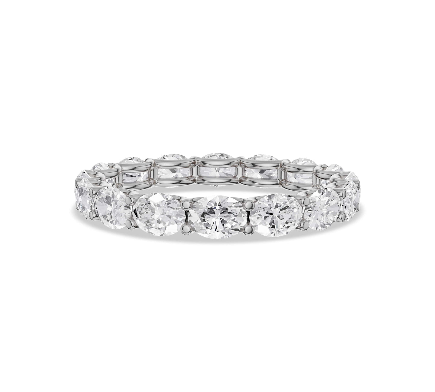White gold eternity band with oval moissanites