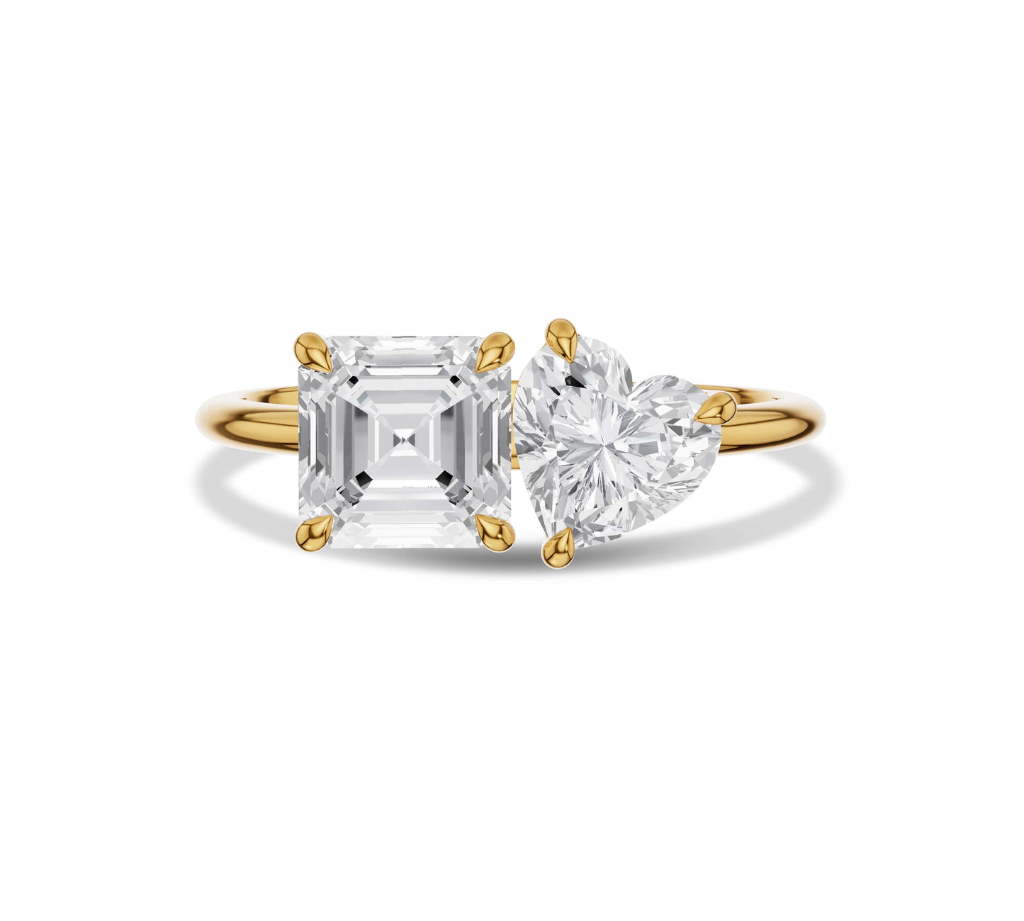 Yellow gold Toi et Moi ring with asscher and heart shaped diamonds