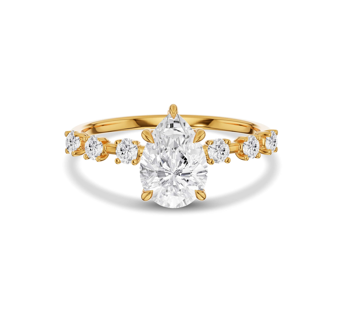 Pear shaped center diamond ring in yellow gold