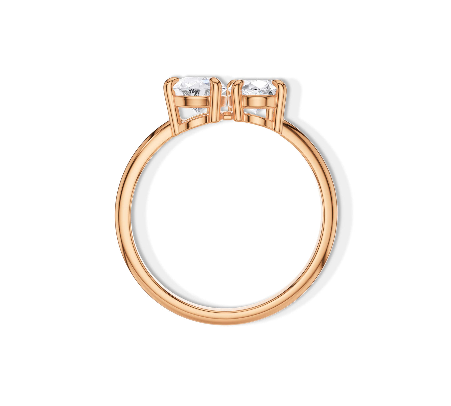Delicate rose gold band with pear and oval lab grown gems