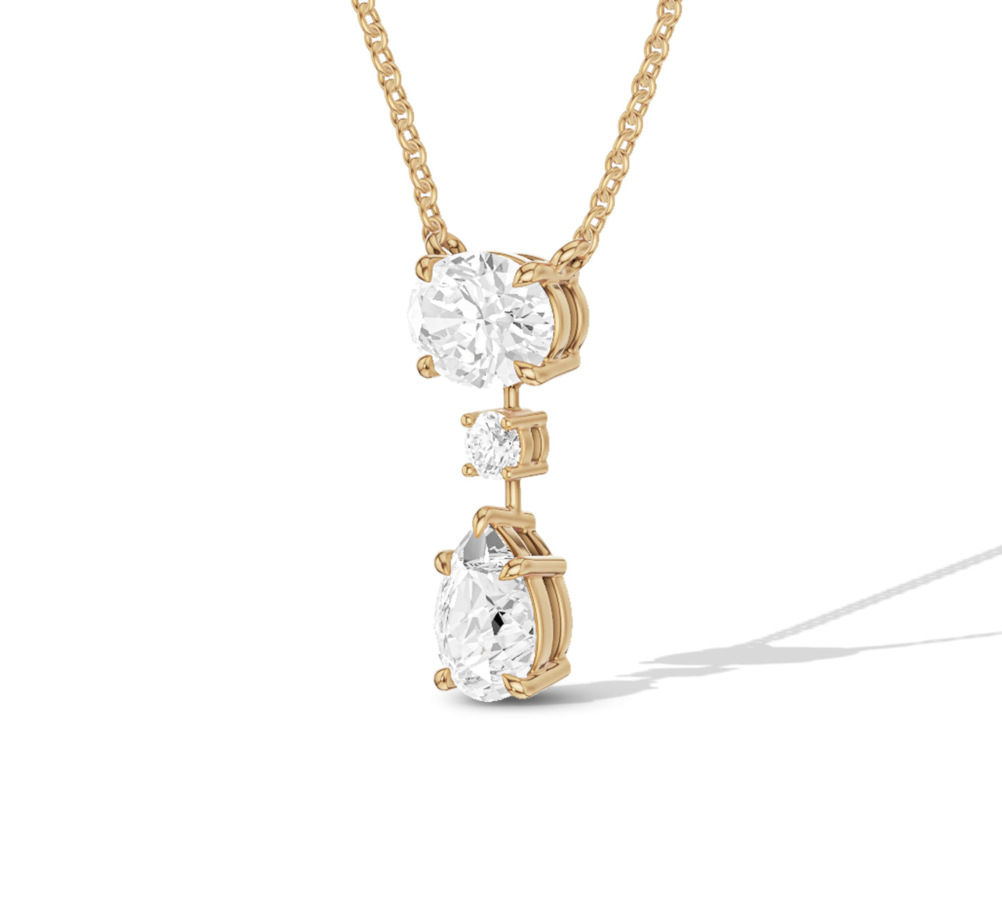Three stone drop necklace in gold