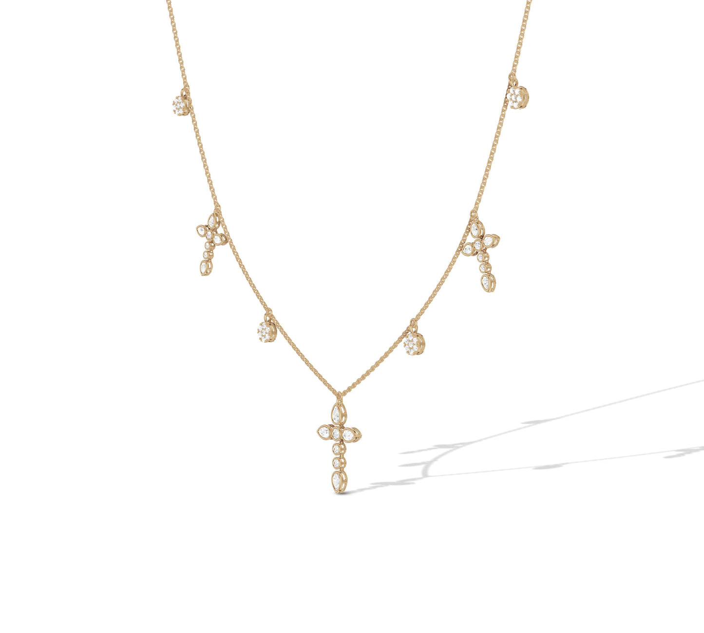 Floral-inspired cross pendant in 14K gold
