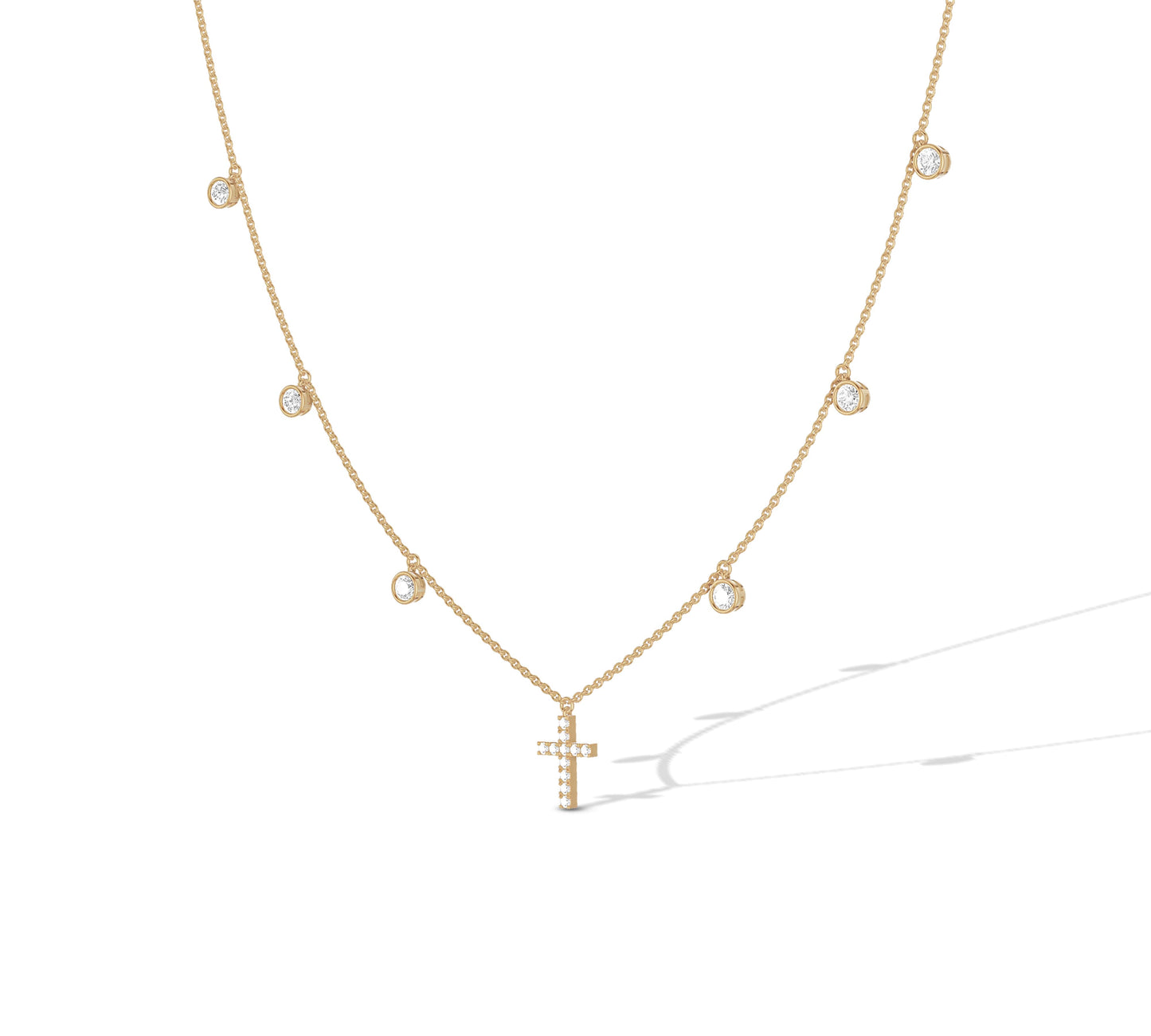Yellow gold fine chain necklace with single cross and diamonds