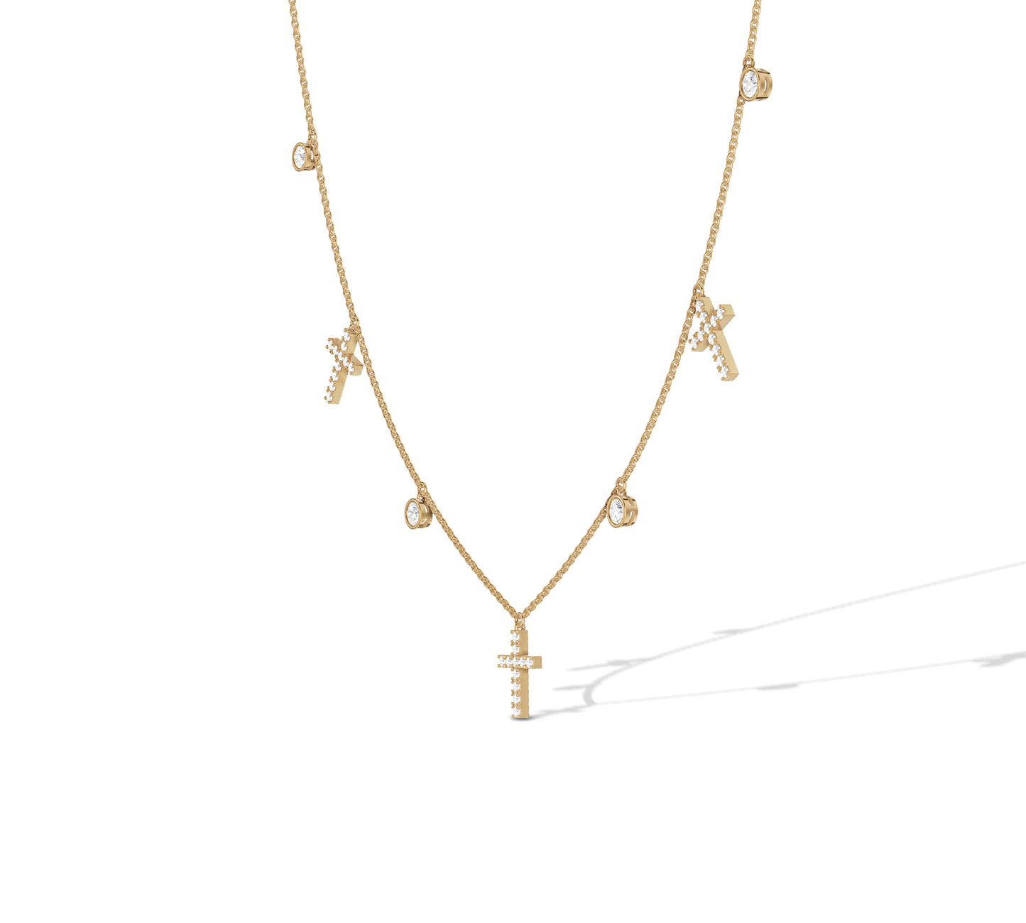 Dainty yellow gold necklace with diamond bezel and cross charms