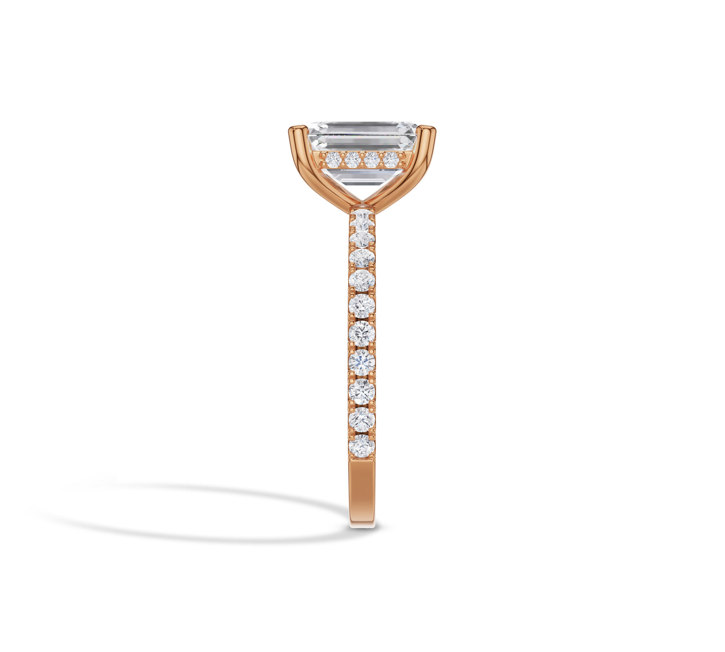 Elegant emerald solitaire in rose gold band