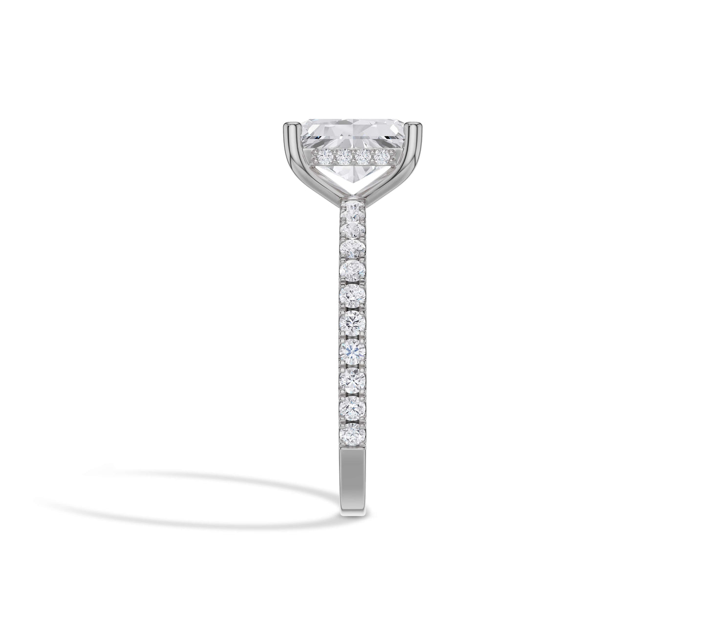 Radiant solitaire in white gold with pavé band and hidden halo