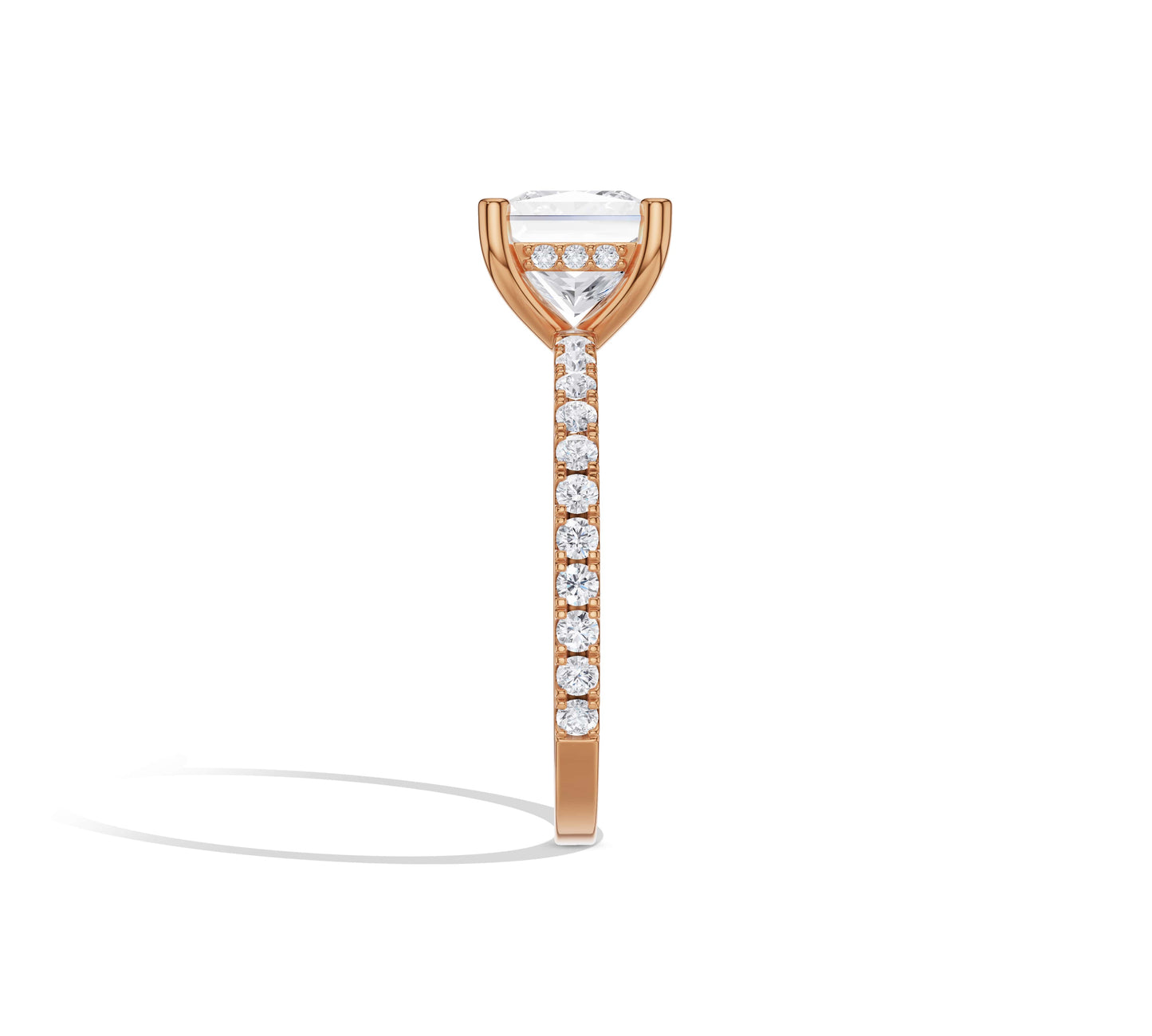 Princess solitaire in 14K rose gold with pavé accents