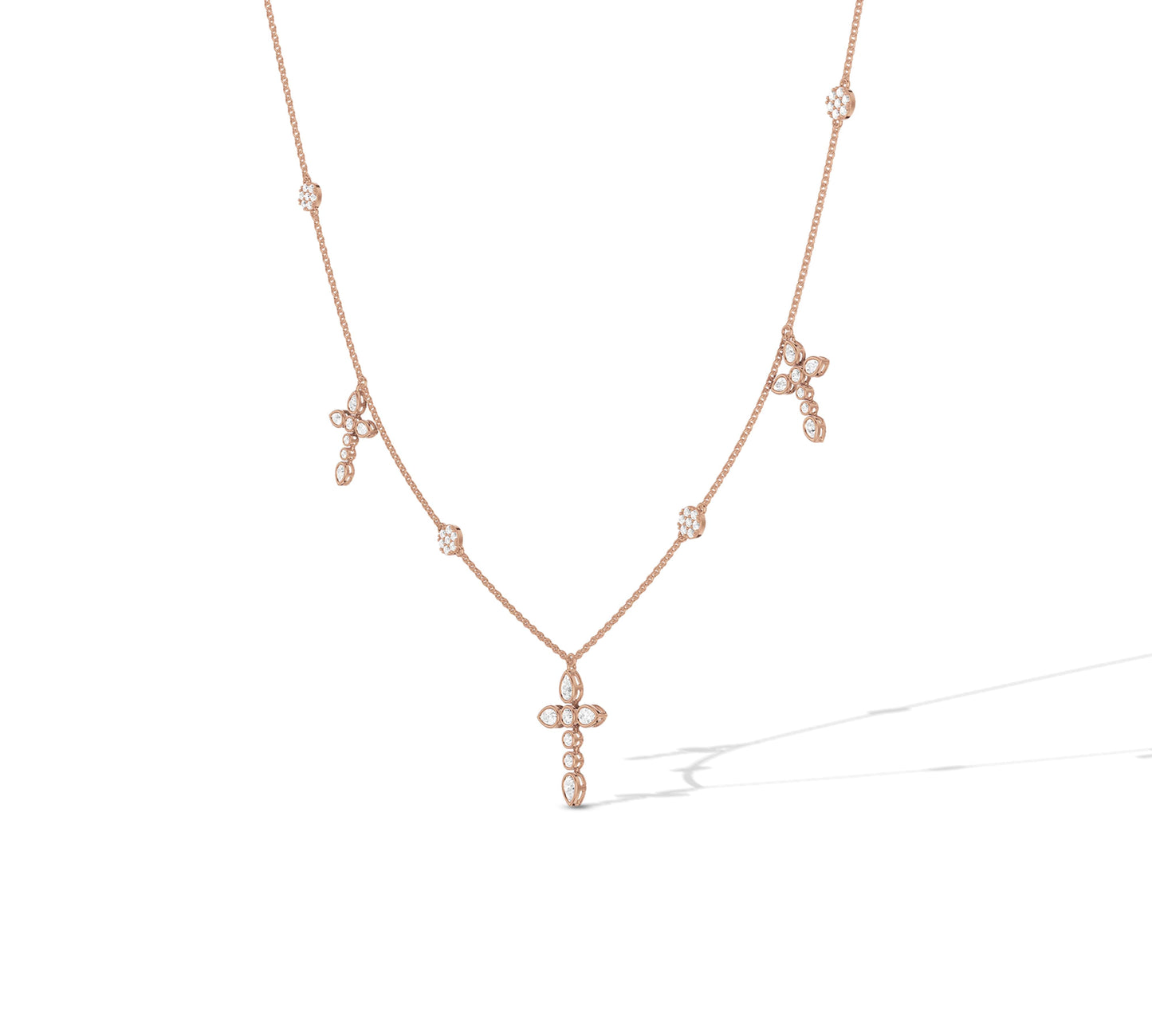 Feminine rose gold cross necklace with floral sparkle