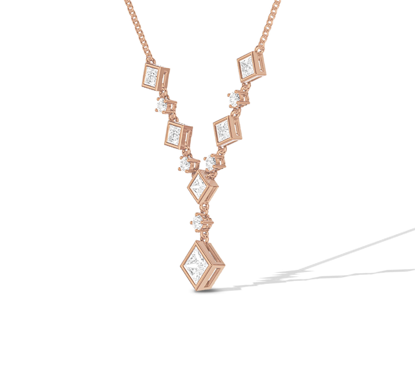 Gold necklace featuring square cut diamonds