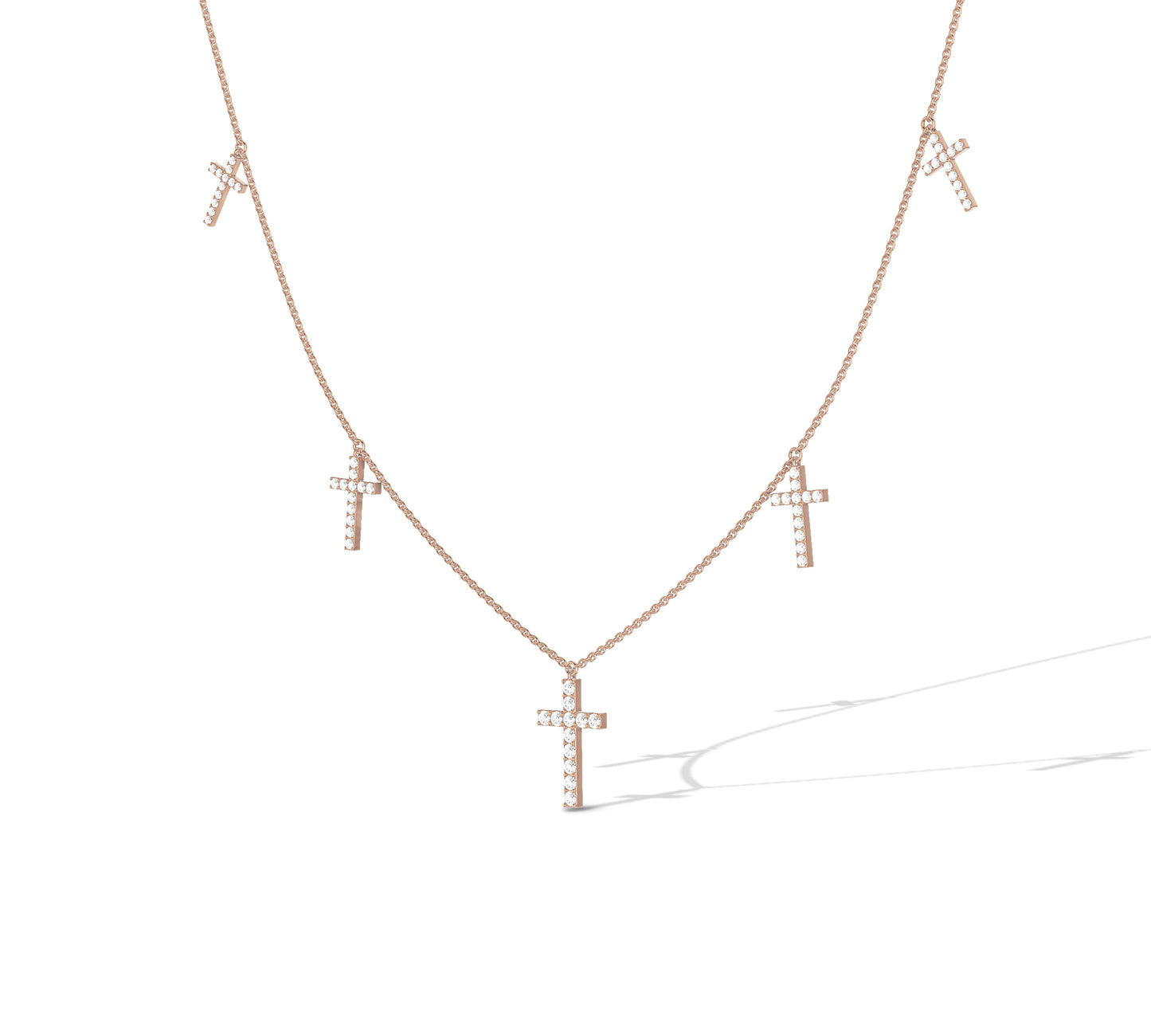 rose gold necklace with diamond-encrusted crosses
