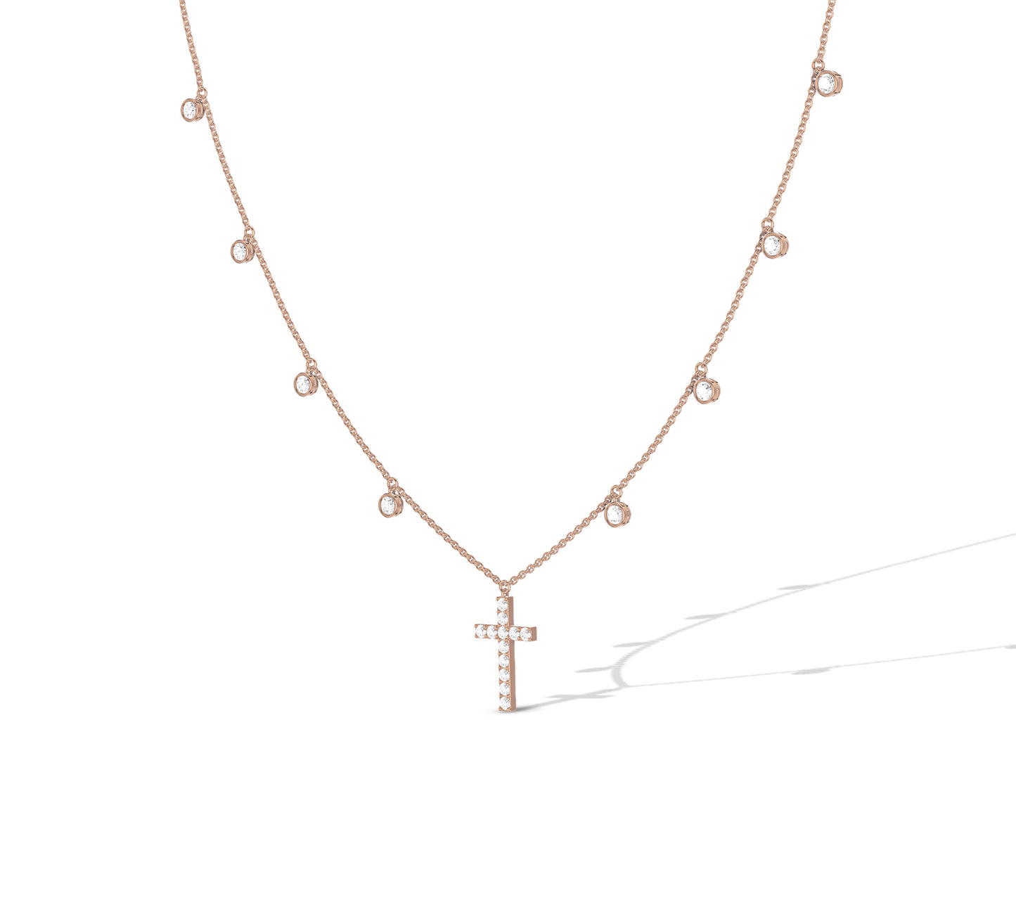 Gold chain with floating bezel diamonds and cross