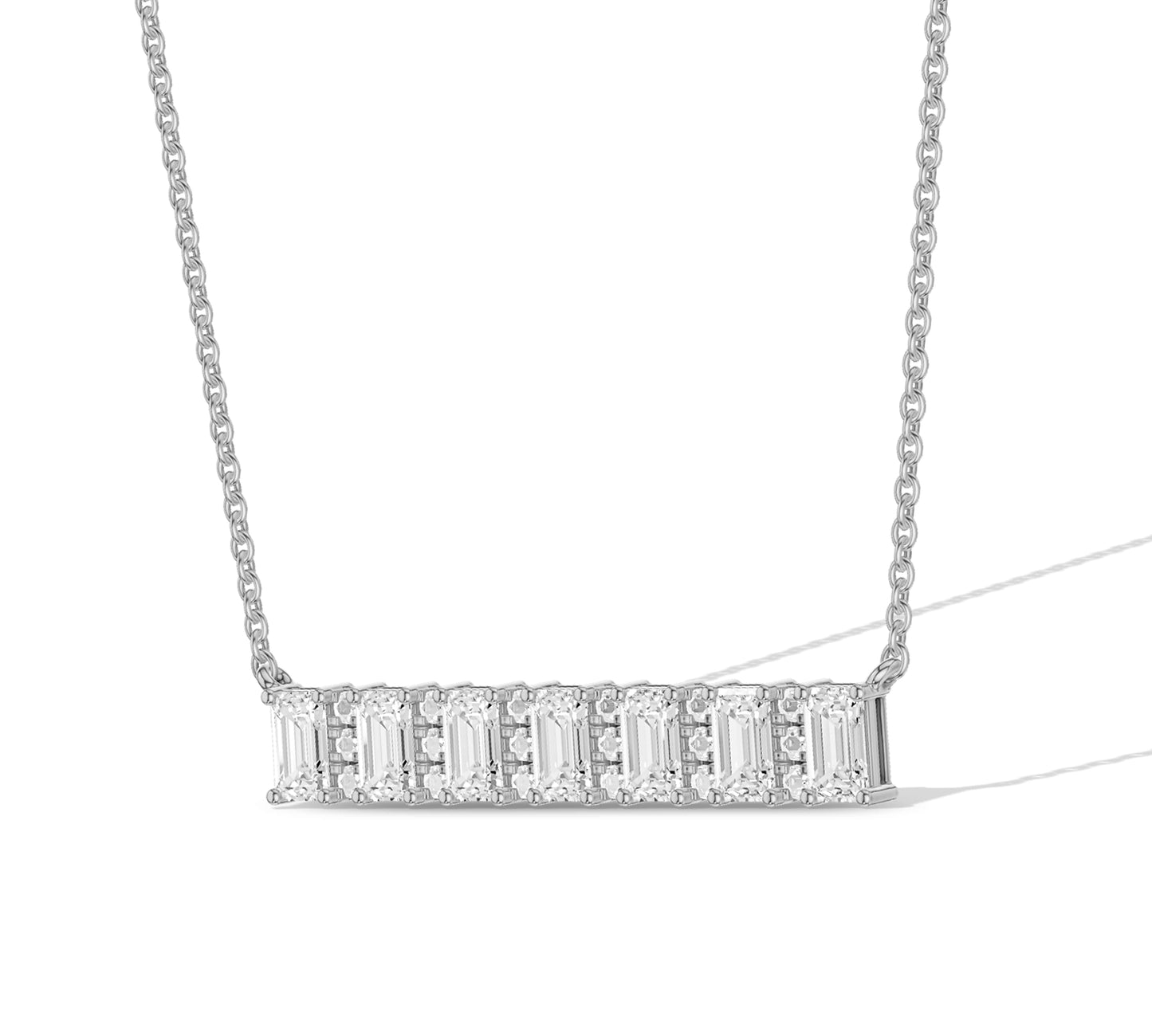 Necklace with emerald cut diamond accents