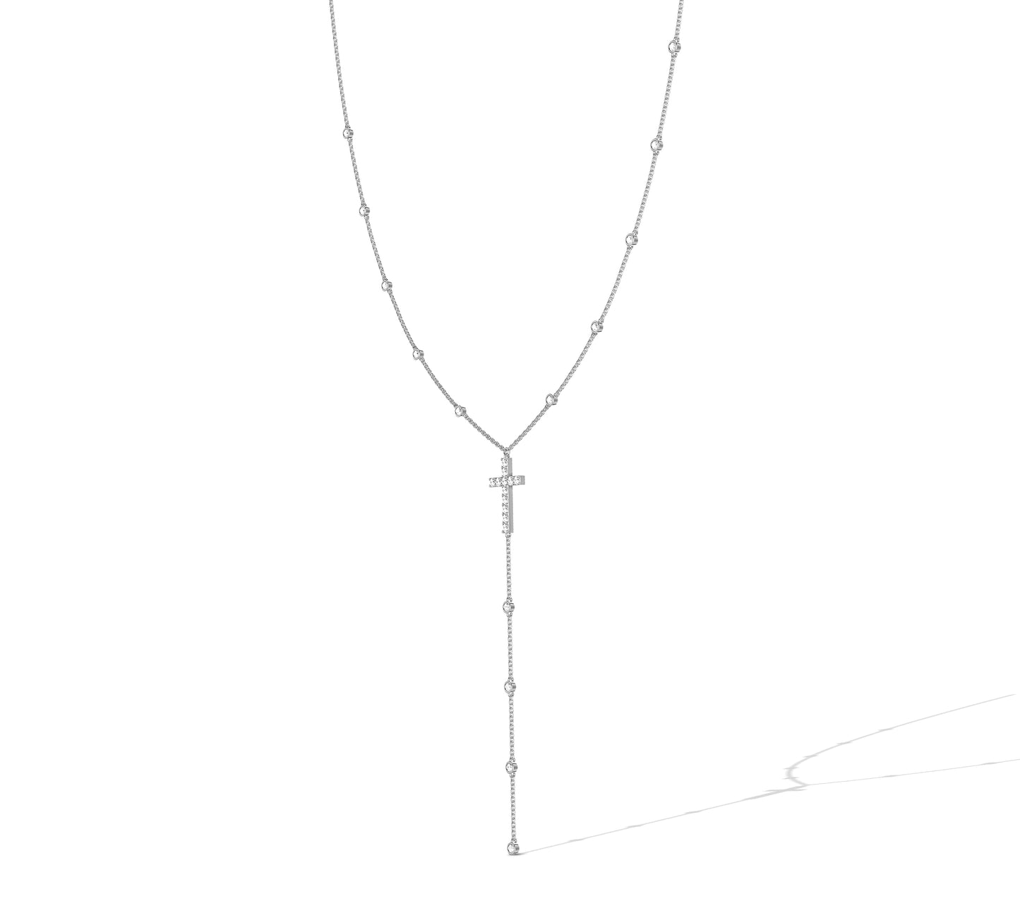 Fine gold chain with cross and round diamond accents