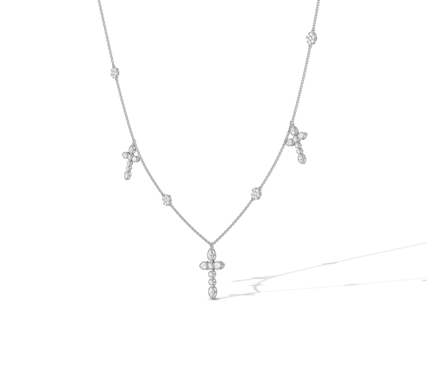 Elegant white gold necklace with pear and round cluster cross