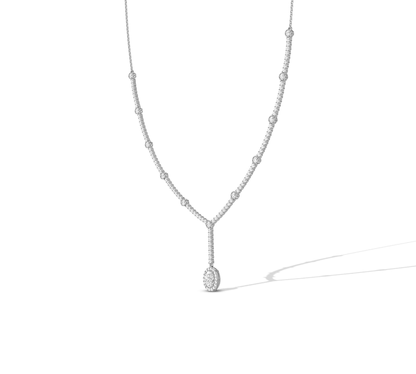 Gold lariat necklace with bezel diamonds and center drop