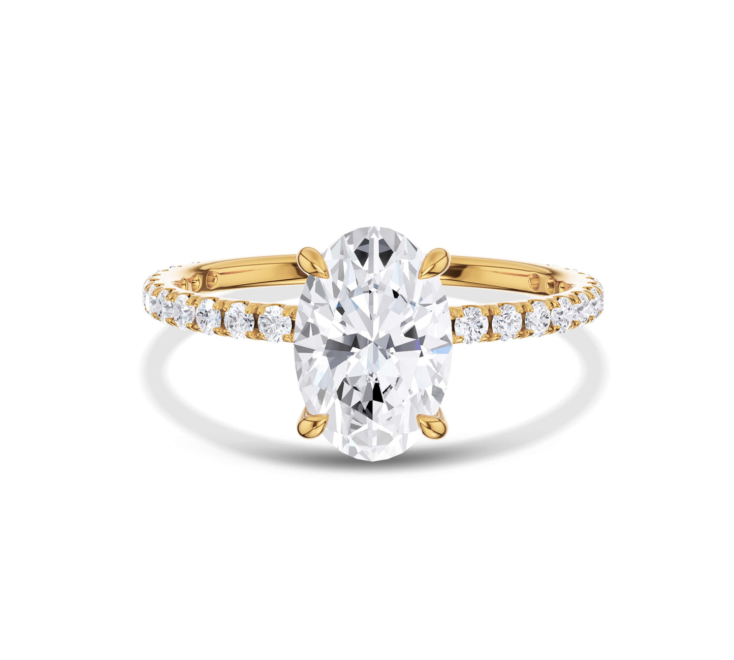 Oval lab grown diamond ring with yellow gold pave setting