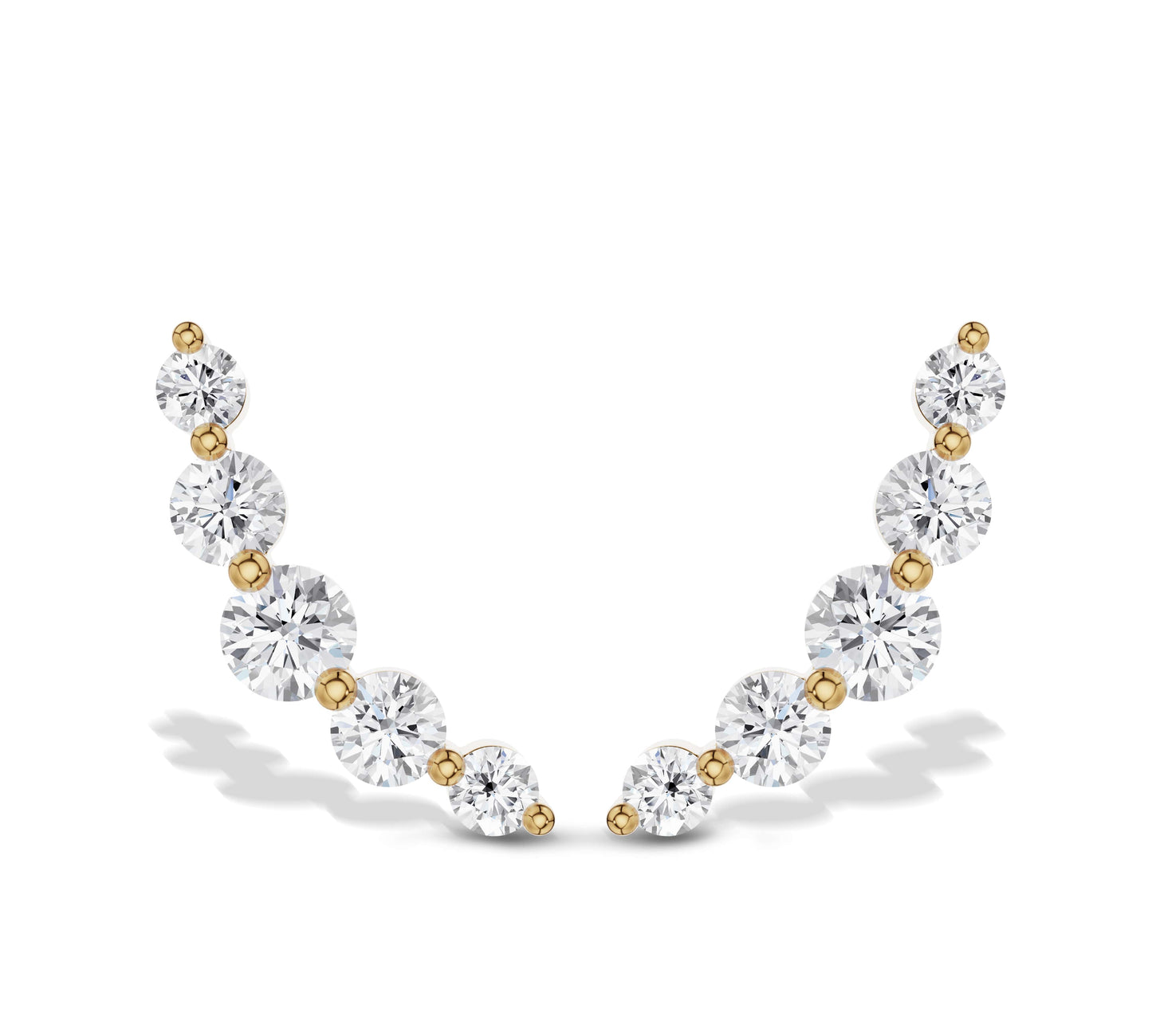 Graduated diamond climber earrings in yellow gold