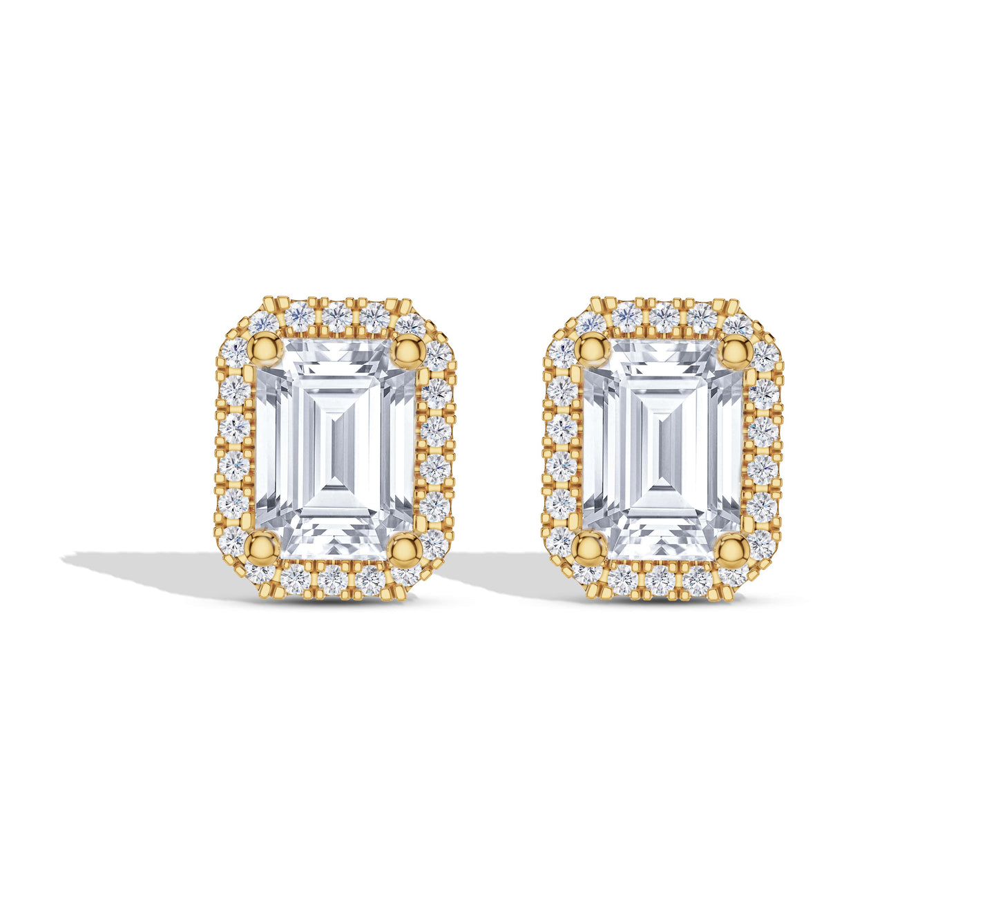 Emerald cut halo diamond earrings in yellow gold